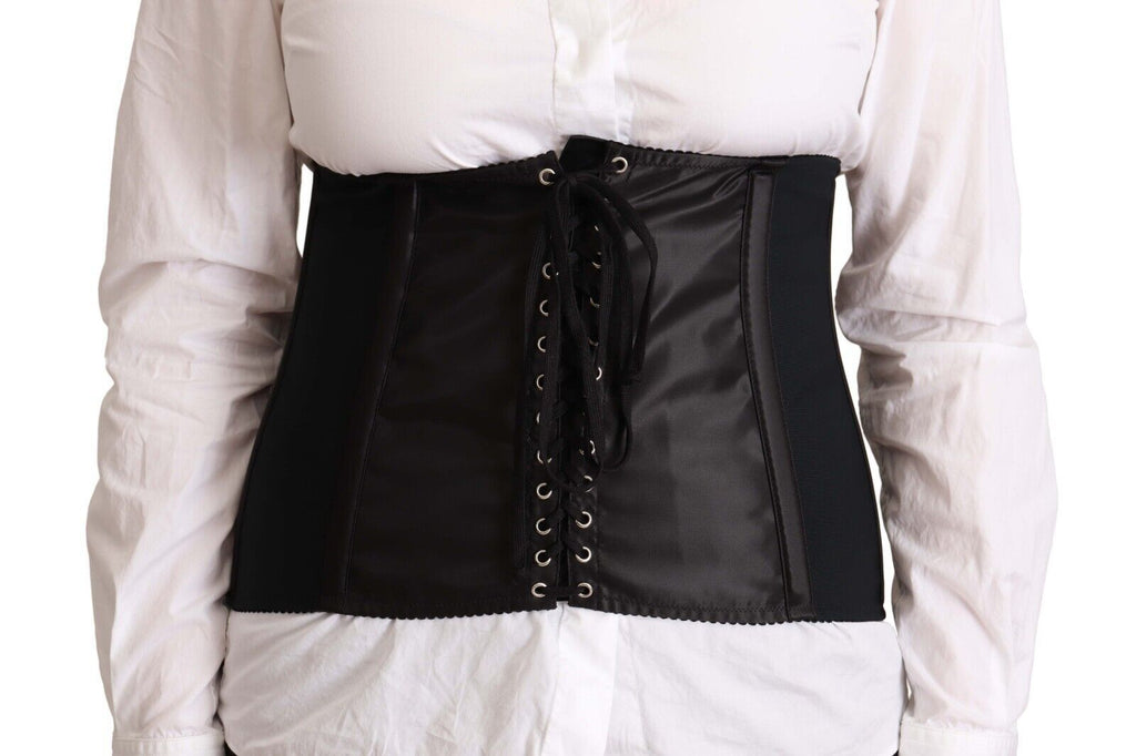 Ceinture corset noire Dolce & Gabbana en stretch avec bande à la taille, portée sur un haut élégant.