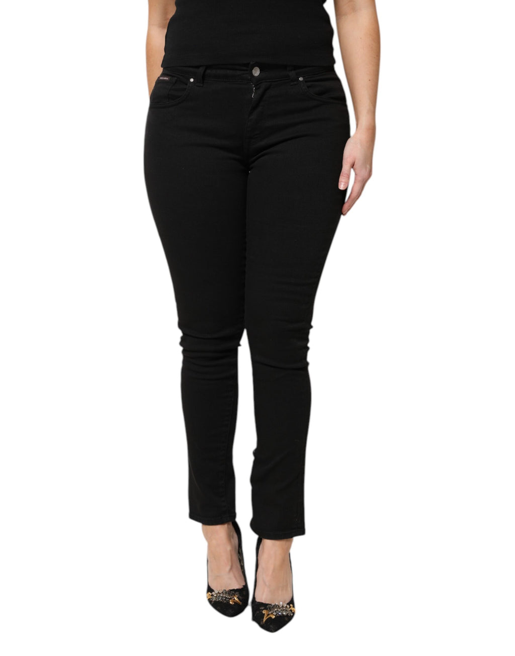 Jeans skinny en denim noir Dolce & Gabbana en coton, coupe taille moyenne, avec logo visible.