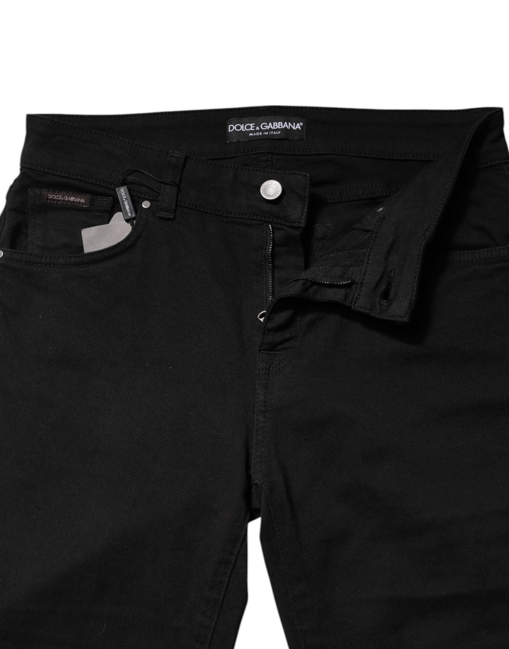 Jeans skinny en denim noir Dolce & Gabbana, coupe mi-hauteur, logo visible, tissu en coton, style ajusté et moderne.