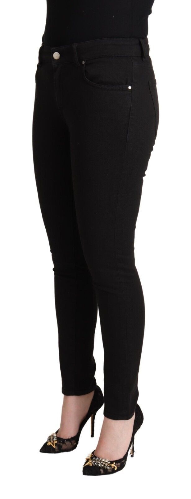 Jeans slim en coton noir Dolce & Gabbana à taille moyenne, ajustés, avec détails modernes visibles sur l'image.