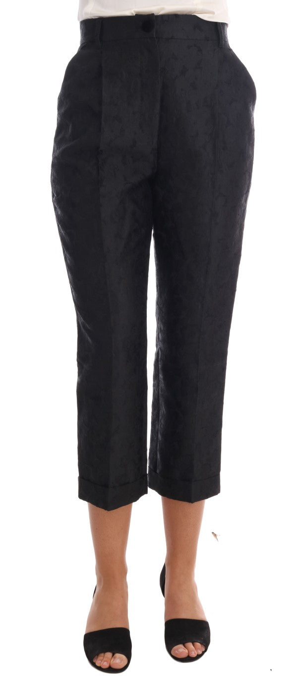 Pantalons Capri en brocart floral noir de Dolce & Gabbana, style élégant et sophistiqué, tissu riche et détails raffinés.