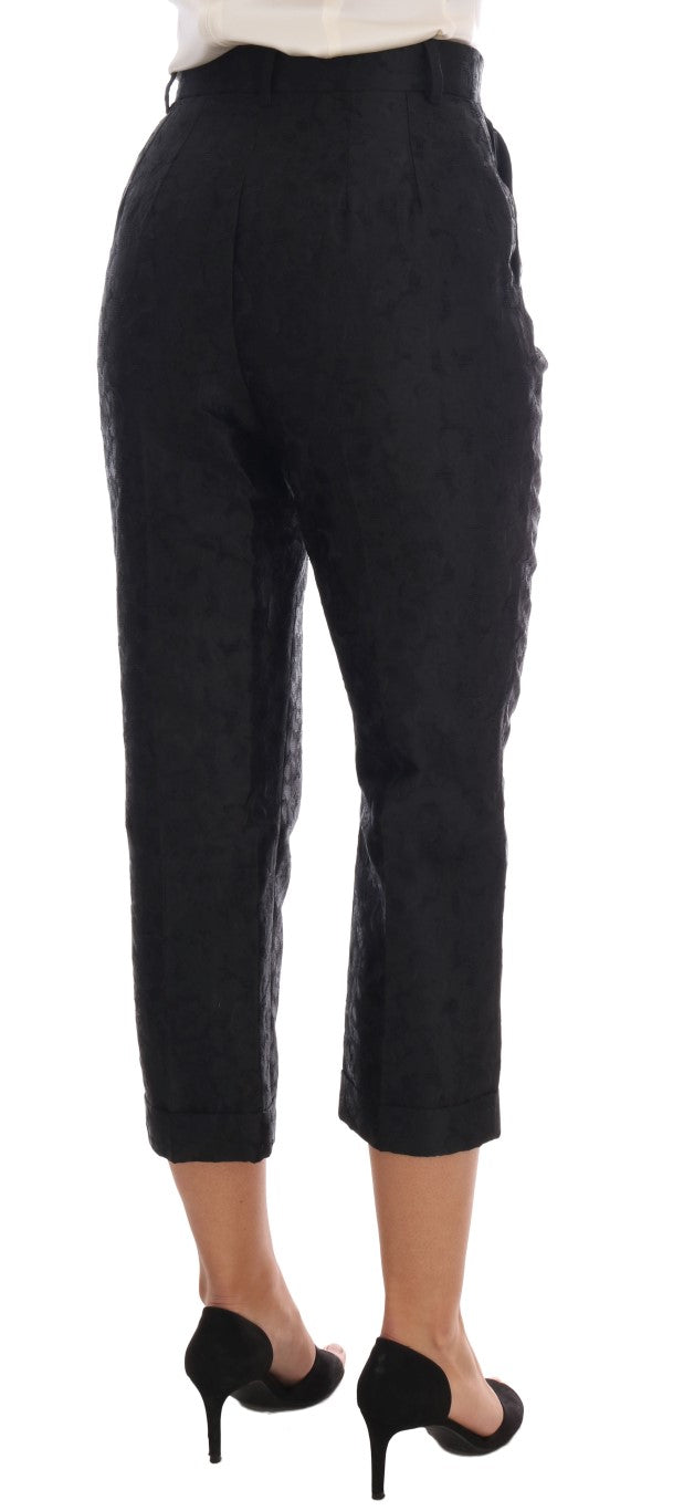 Pantalons Capri en brocart floral noir de Dolce & Gabbana, style élégant et sophistiqué.