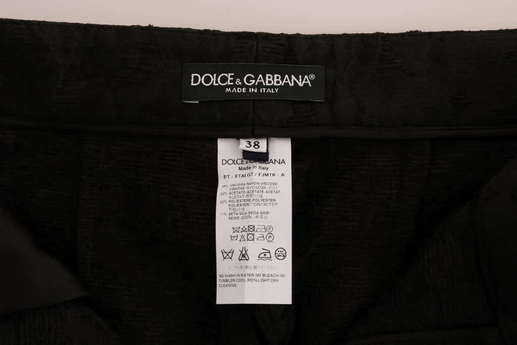 Pantalons Capri en brocart floral noir de Dolce & Gabbana, style élégant et sophistiqué pour femme.