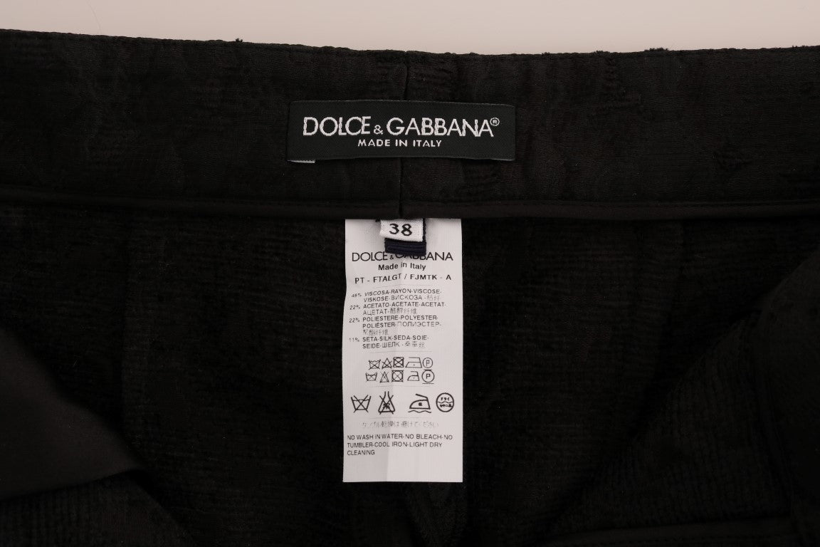 Pantalons Capri en brocart floral noir de Dolce & Gabbana, style élégant et sophistiqué pour femme.