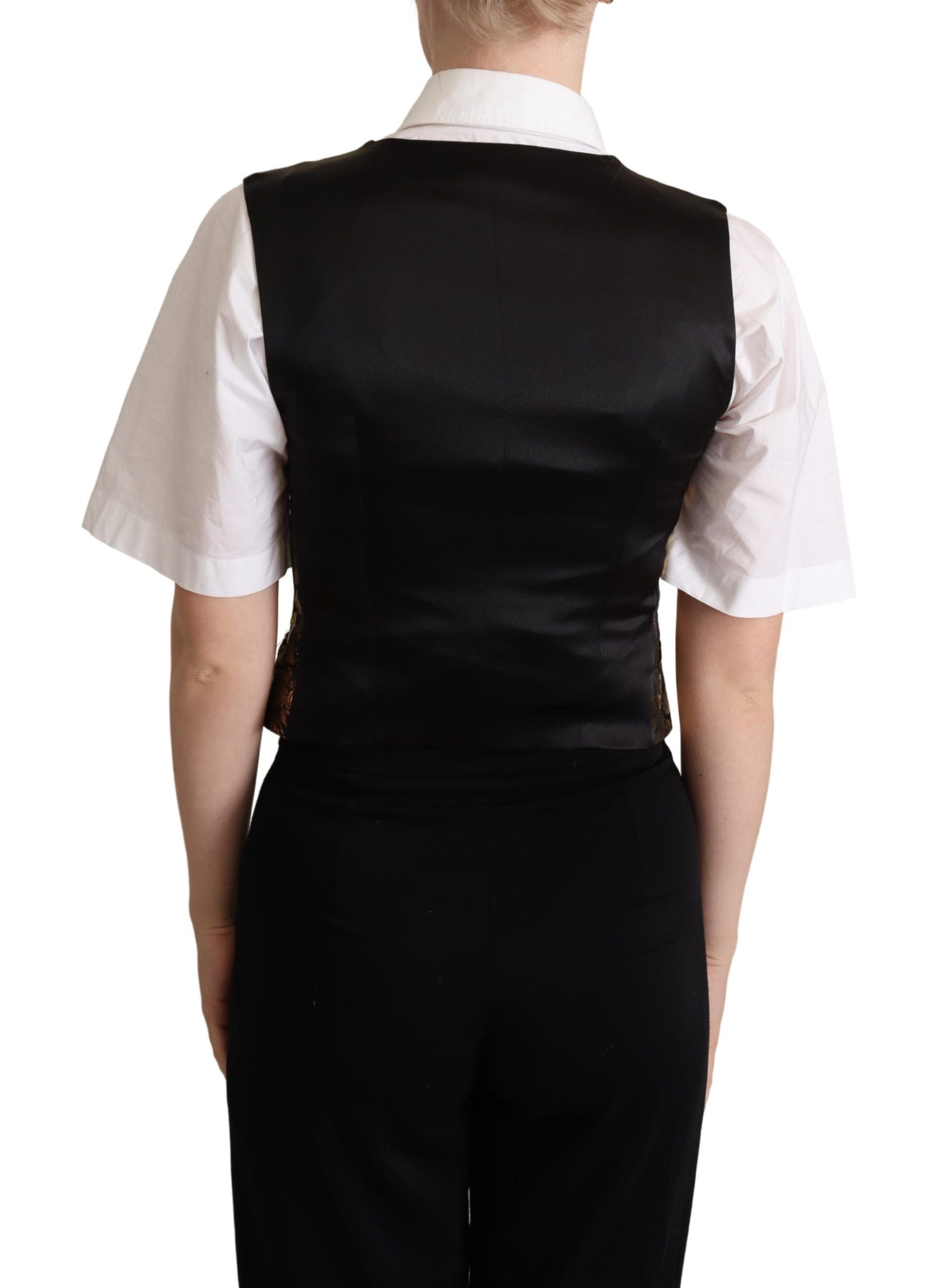 Gilet en jacquard de soie noir et or de Dolce & Gabbana, veste ajustée avec détails élégants et motifs sophistiqués.