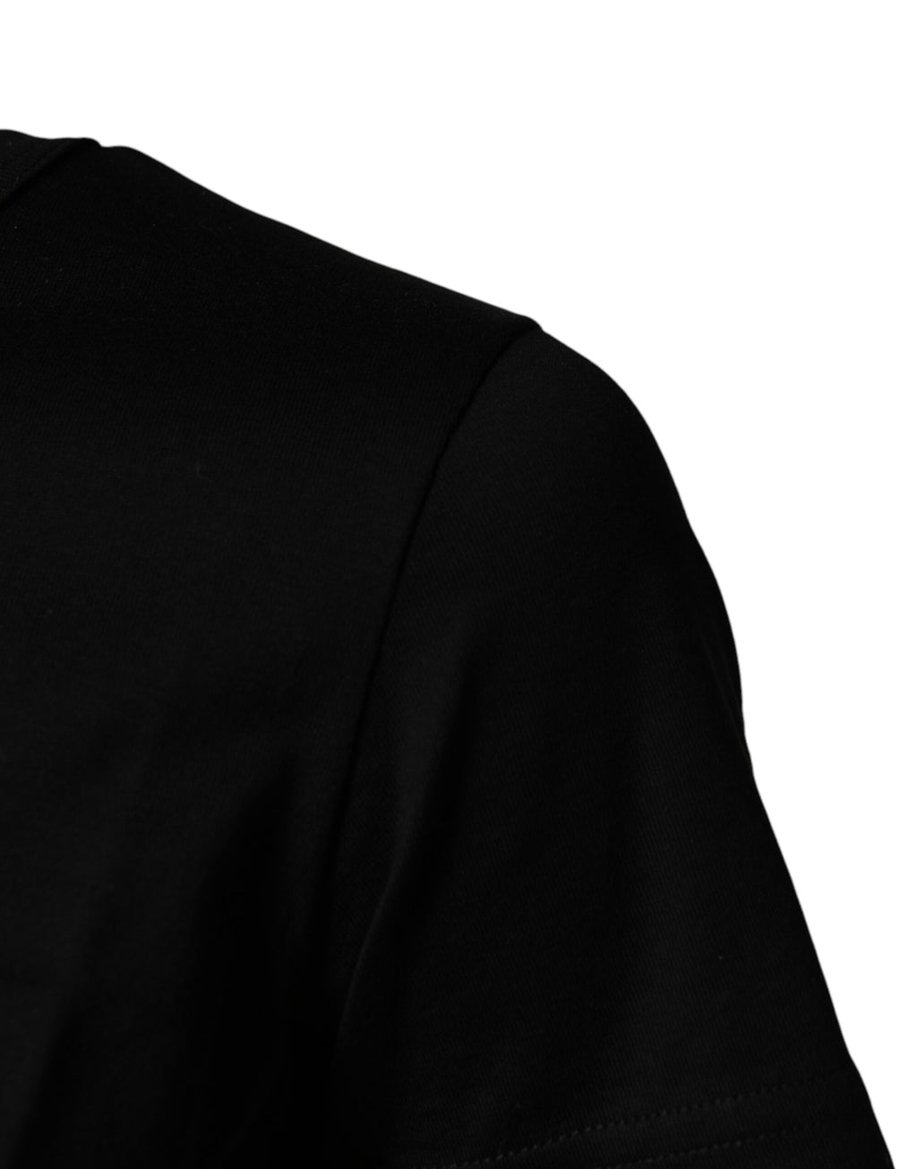 T-shirt noir à manches courtes avec motif graphique de Dolce & Gabbana, col rond, style moderne et élégant.