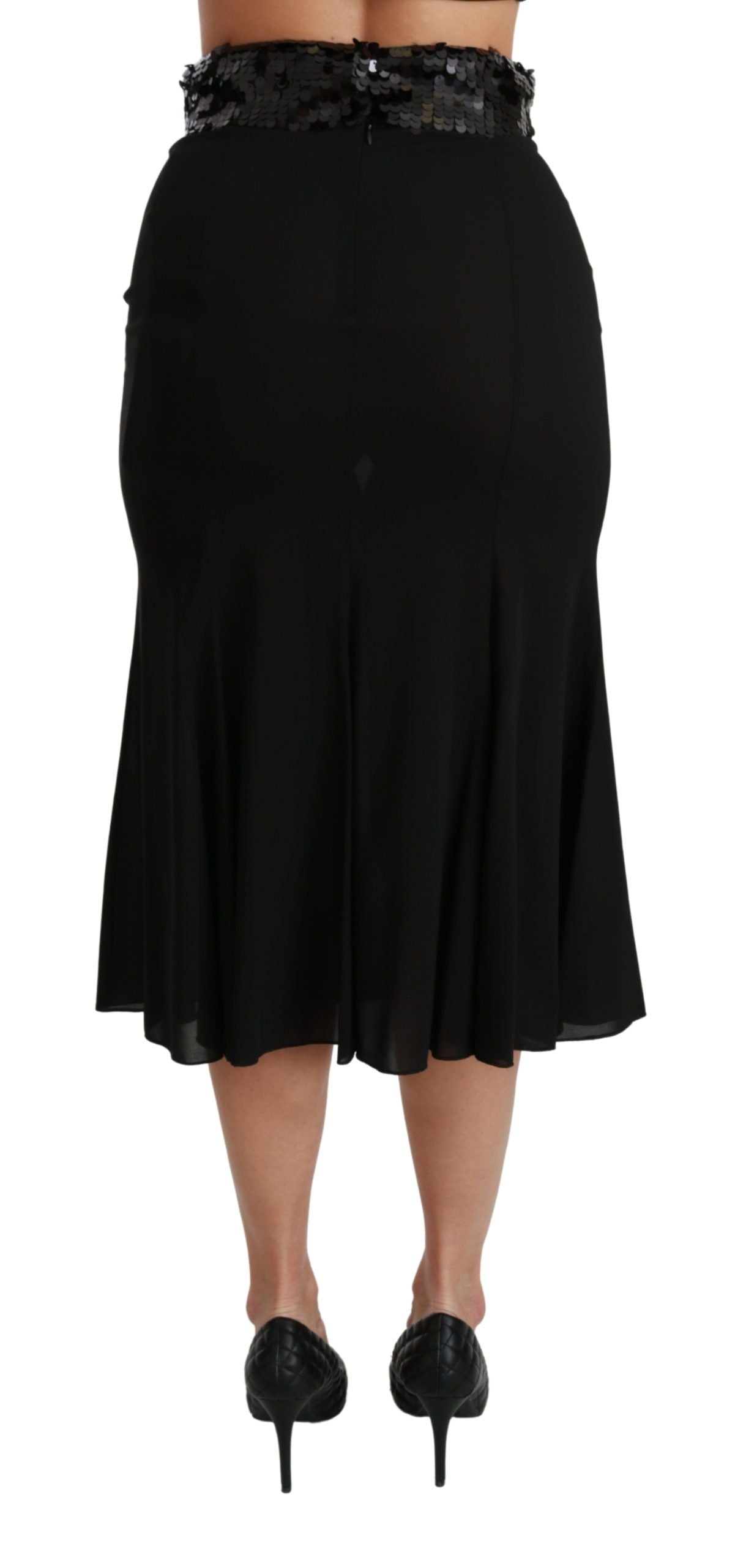 Jupe midi sirène en soie noire à taille haute de Dolce & Gabbana, élégante et sophistiquée, vue en gros plan.