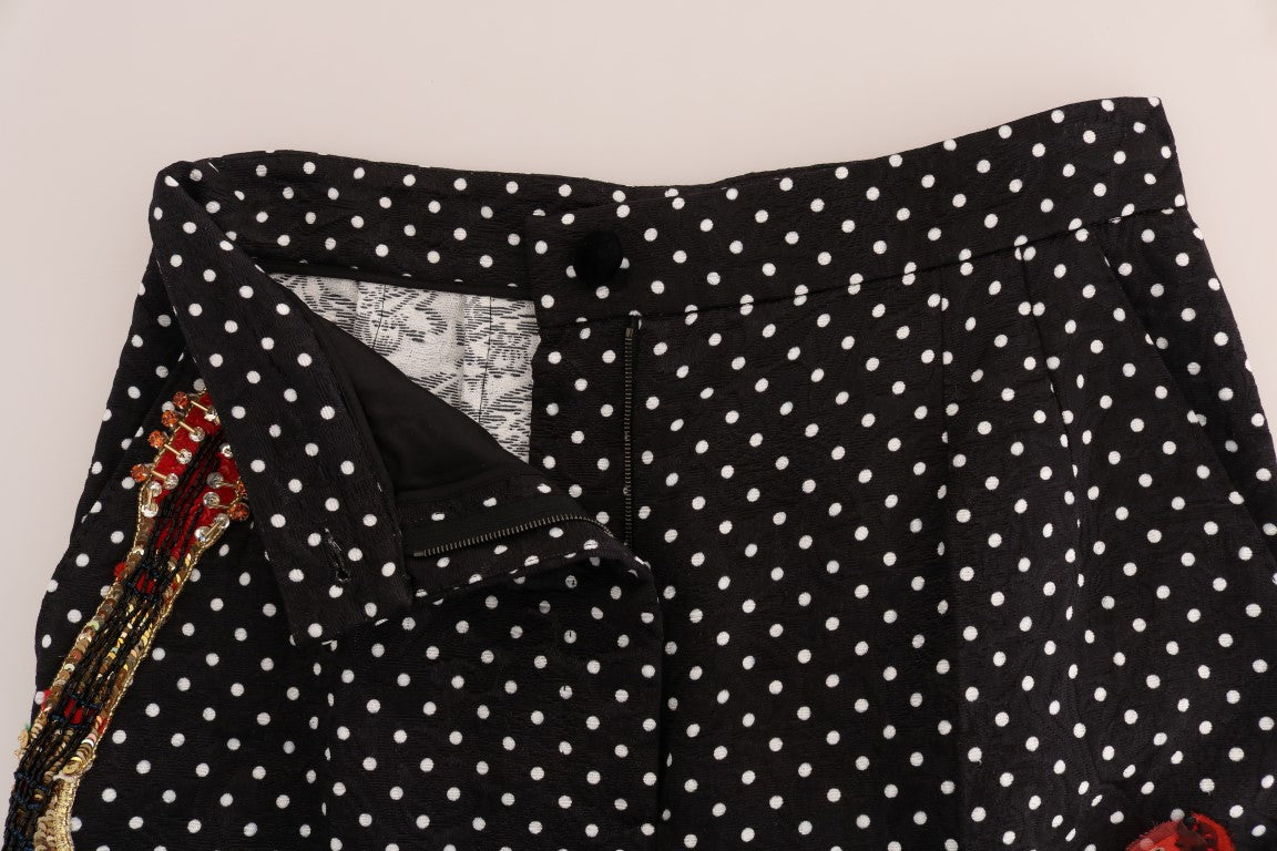 Pantalon noir à pois Dolce & Gabbana Sicily avec cristaux, style élégant et sophistiqué, visible avec détails de motifs à pois et cristaux.
