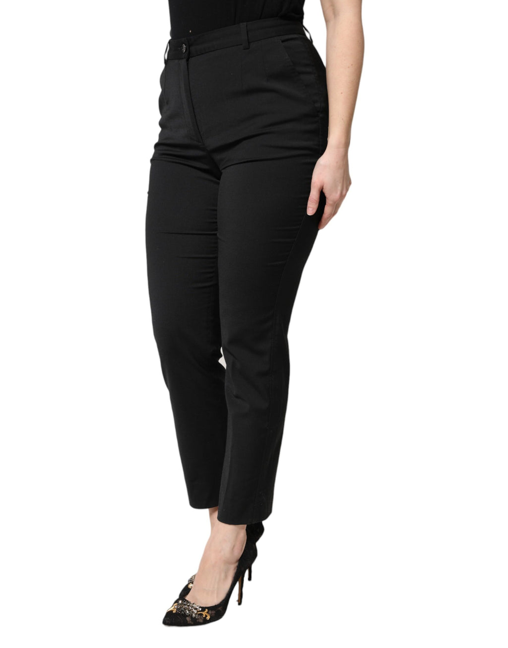 Pantalons slim en polyester noir à taille haute de Dolce & Gabbana, vue de face sur un fond blanc