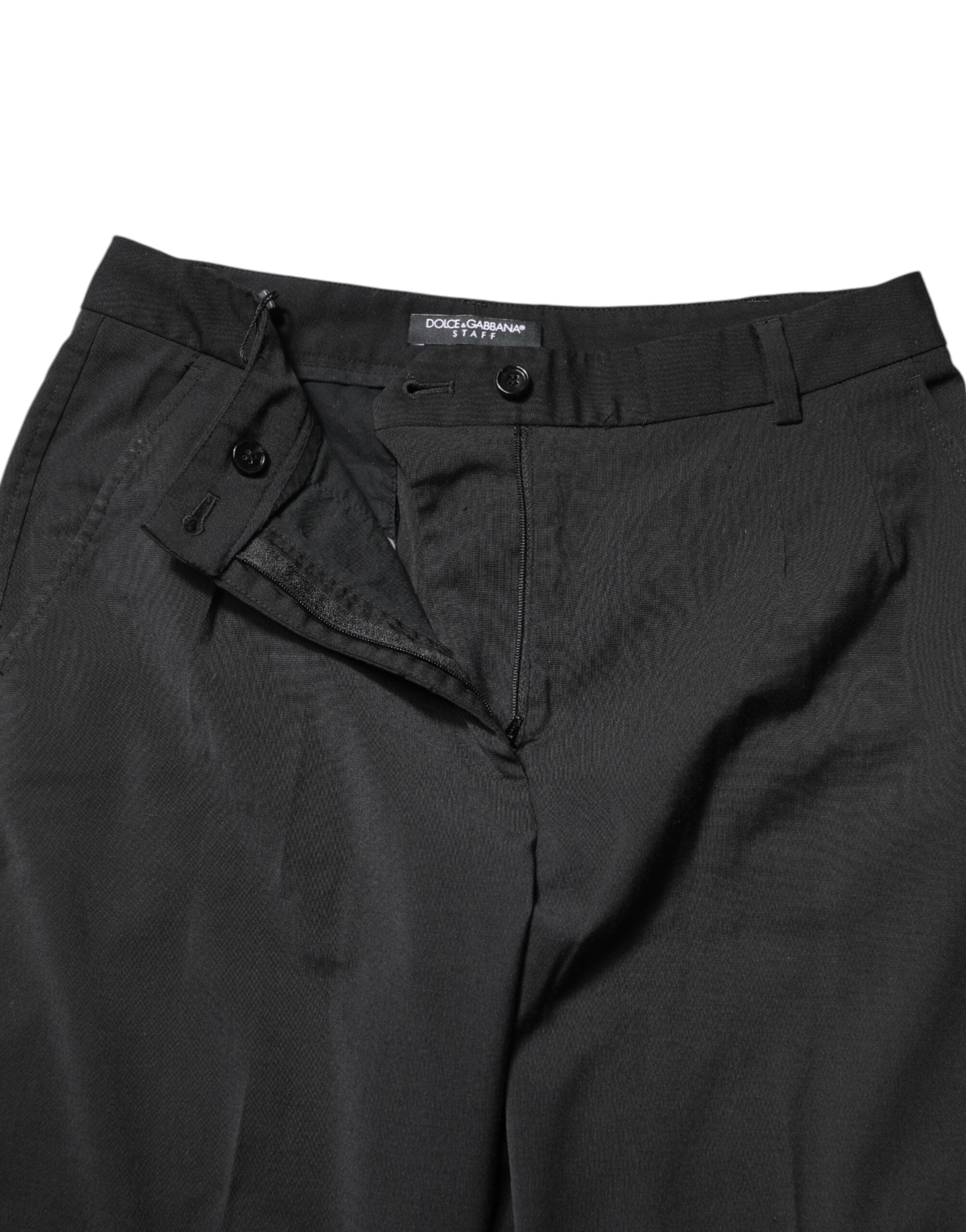 Pantalon slim en polyester noir à taille haute de Dolce & Gabbana, style élégant et moderne, visible sur l'image.
