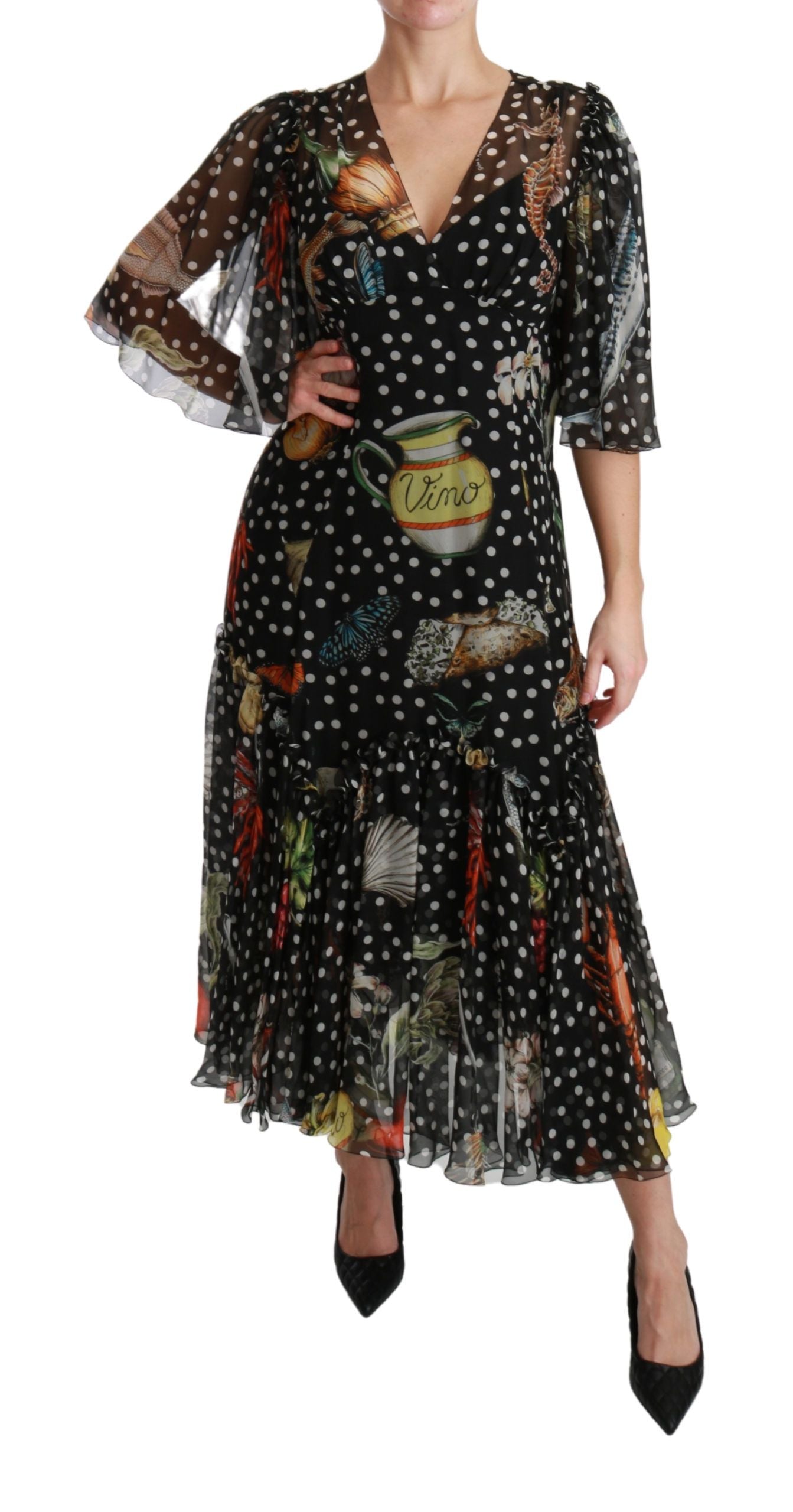 Robe Dolce & Gabbana Sea Fish Sicily en ligne A, noir, élégante, avec motif poisson, portée sur un mannequin.