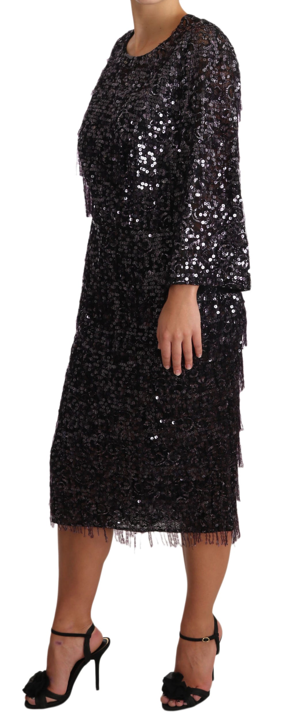 Robe midi noir à sequins à manches longues de Dolce & Gabbana, élégante et sophistiquée, visible avec détails scintillants.