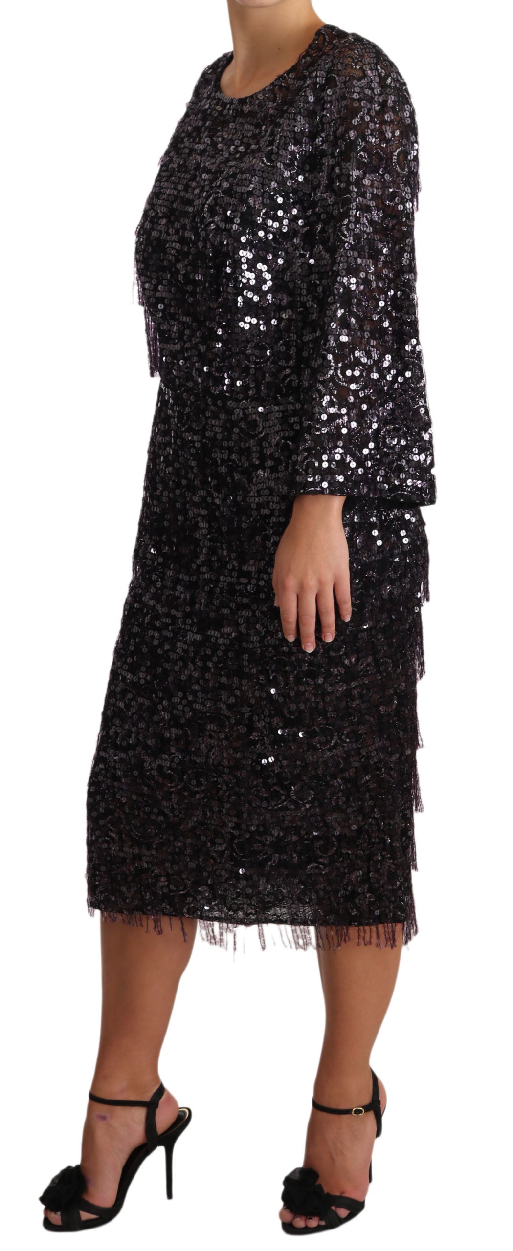 Robe midi noir à sequins à manches longues de Dolce & Gabbana, élégante et sophistiquée, visible avec détails scintillants.