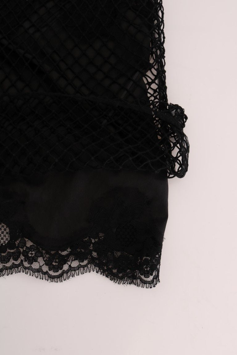 Haut en dentelle en maille de soie noire de Dolce & Gabbana, avec motif floral élégant et détails fins.