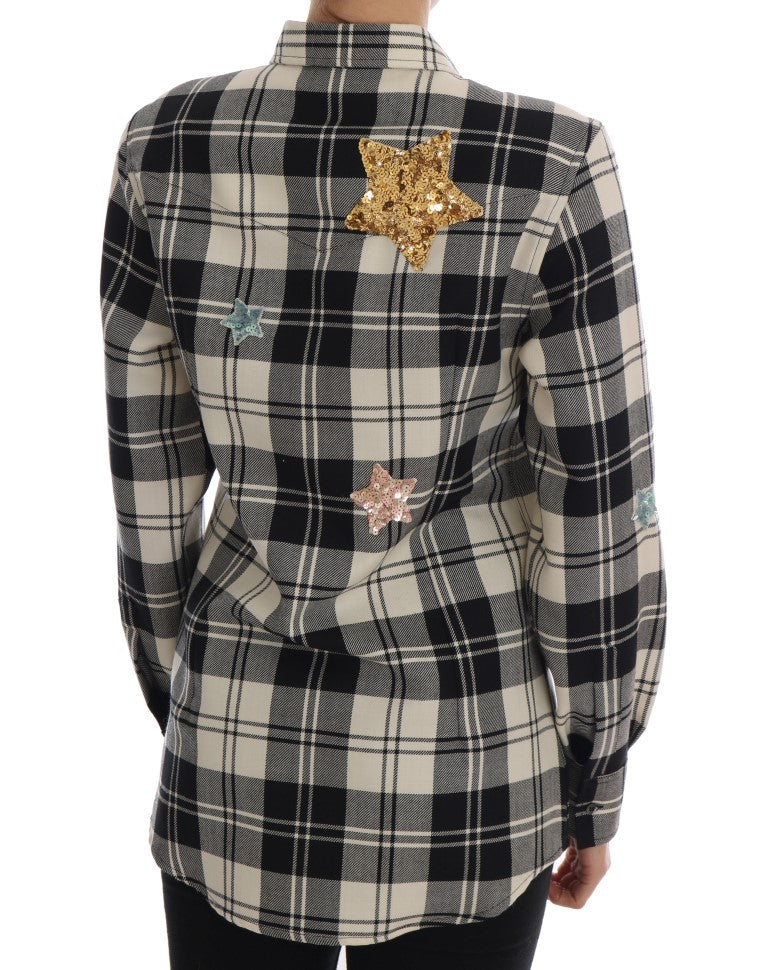 Chemise Dolce & Gabbana blanche et noire avec cristaux et motif conte de fées, élégante et sophistiquée.