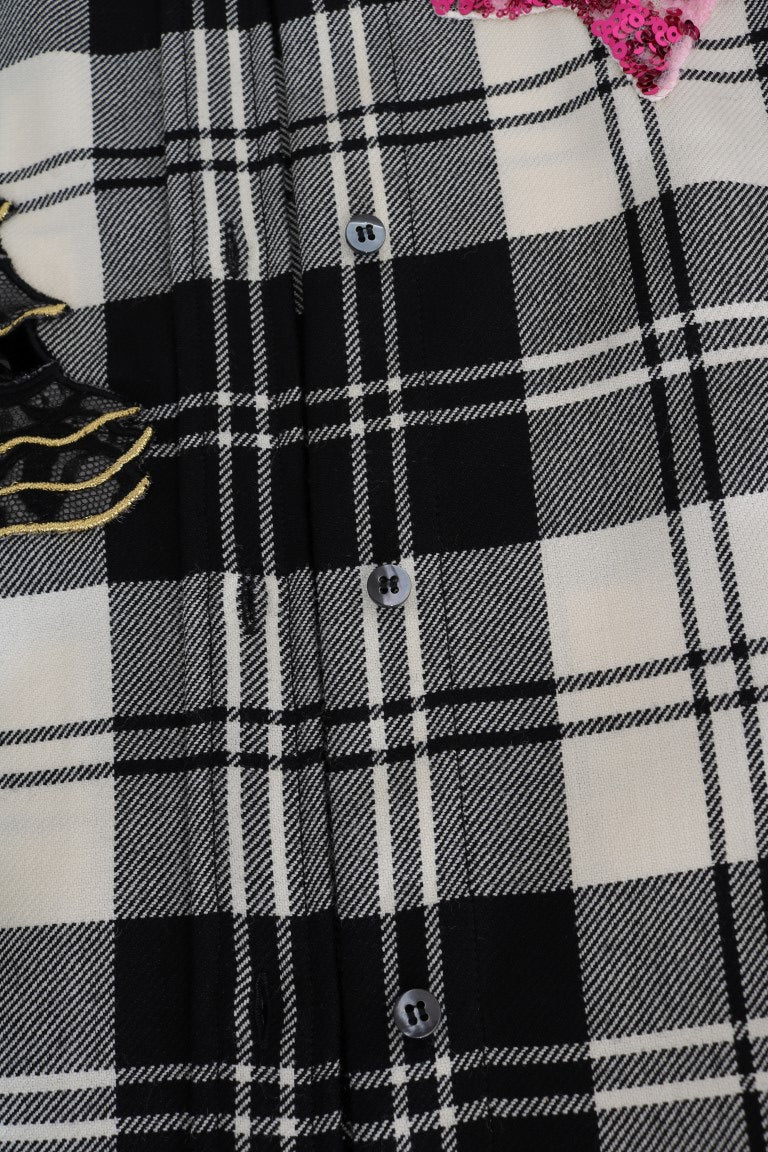 Chemise Dolce & Gabbana Fairy Tale en blanc et noir avec cristaux, détails élégants et motifs féériques visibles sur l'image.