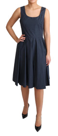 Robe en coton à pois bleus de style A-line par Dolce & Gabbana, avec coupe fluide et détails élégants.