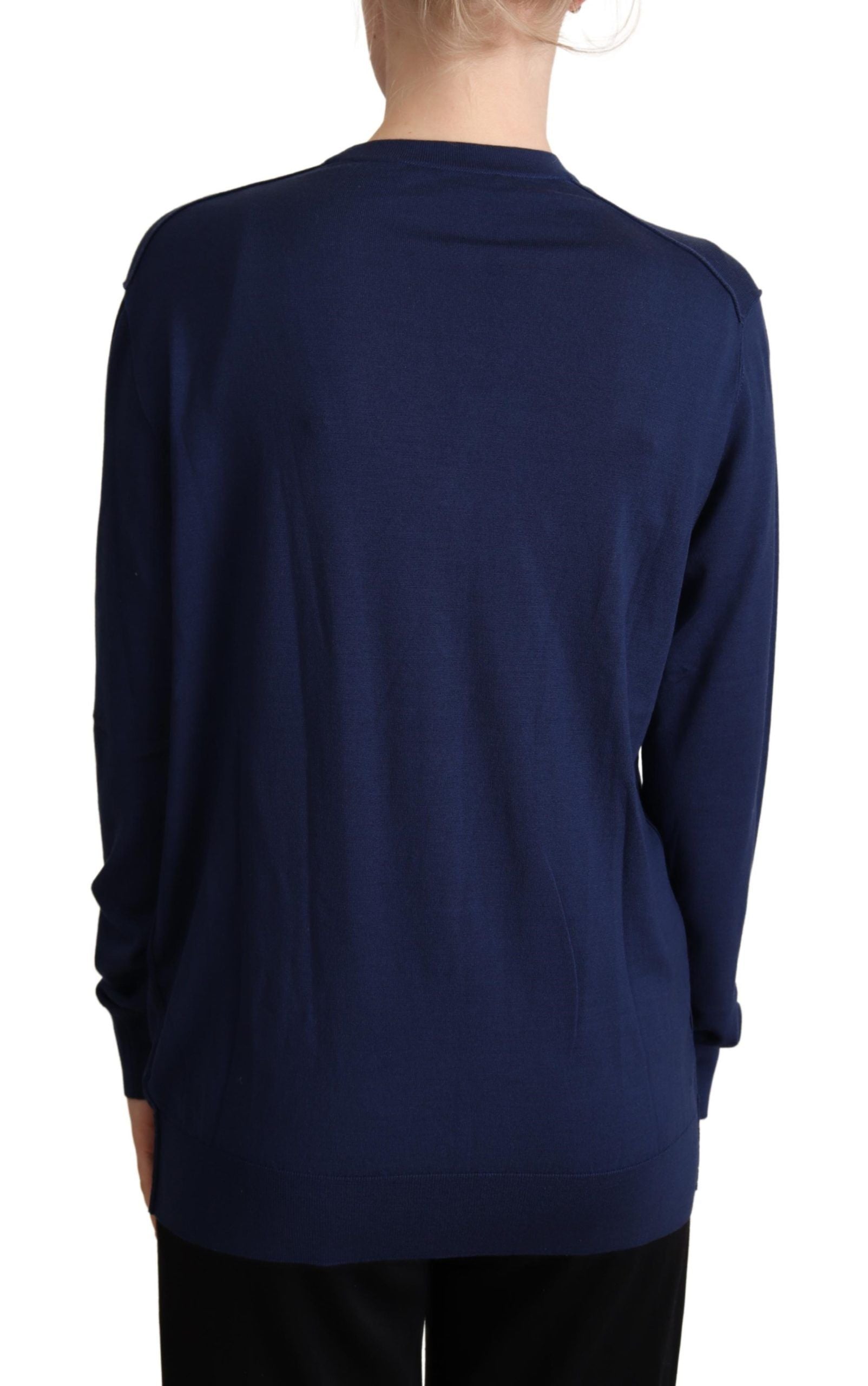 Pull en laine vierge bleue Dolce & Gabbana avec boutons, cardigan élégant et confortable pour un style sophistiqué.