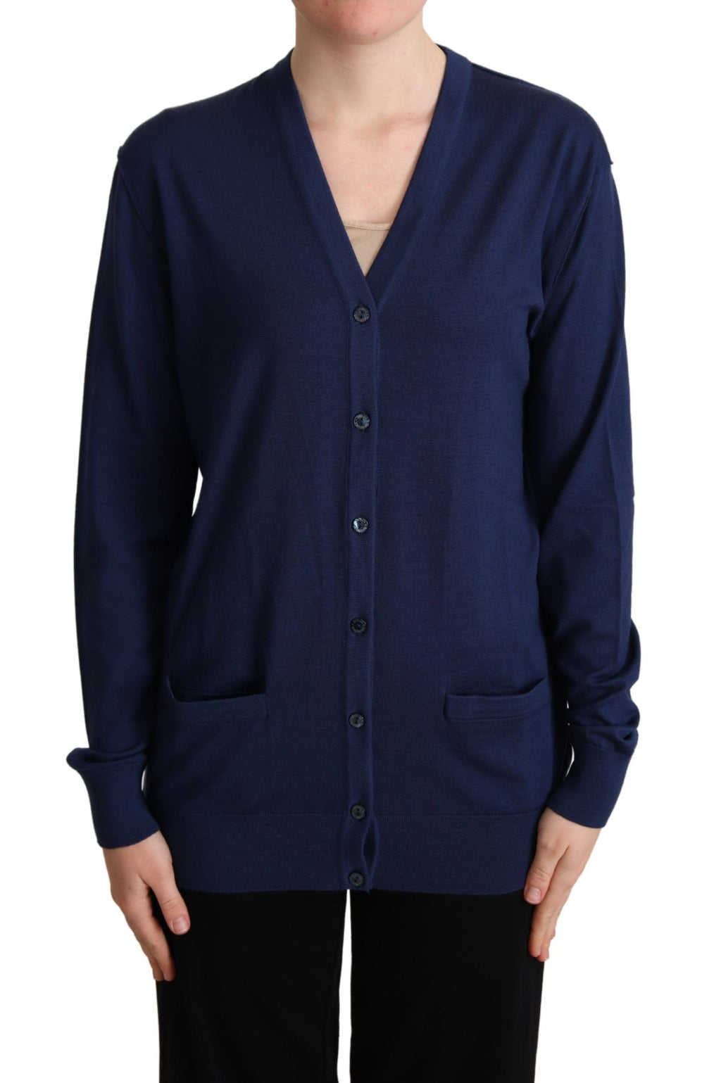 Pull-over cardigan Dolce & Gabbana en laine vierge bleue avec boutons, détails élégants et coupe classique.