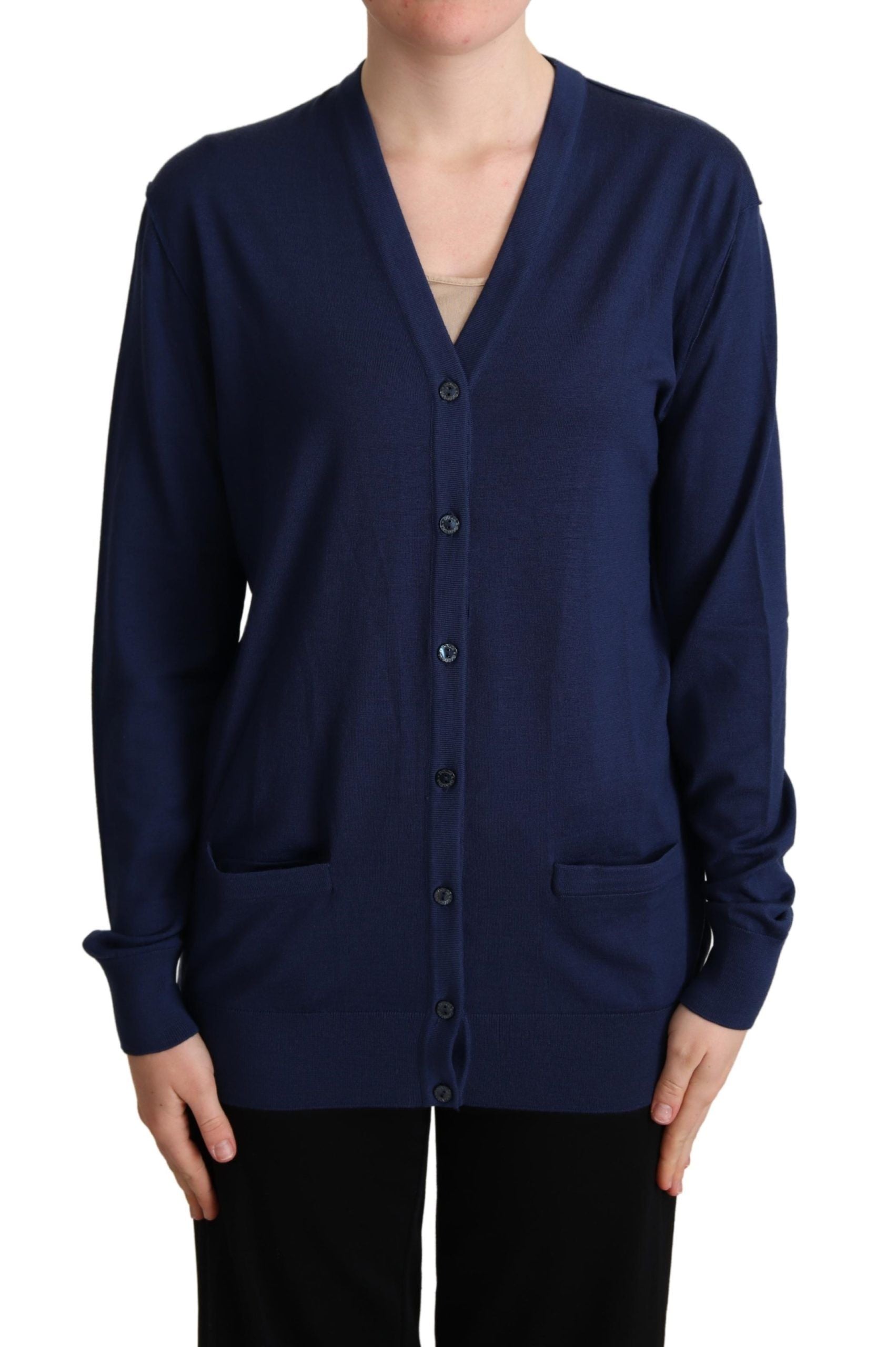 Pull-over cardigan Dolce & Gabbana en laine vierge bleue avec boutons, détails élégants et coupe classique.