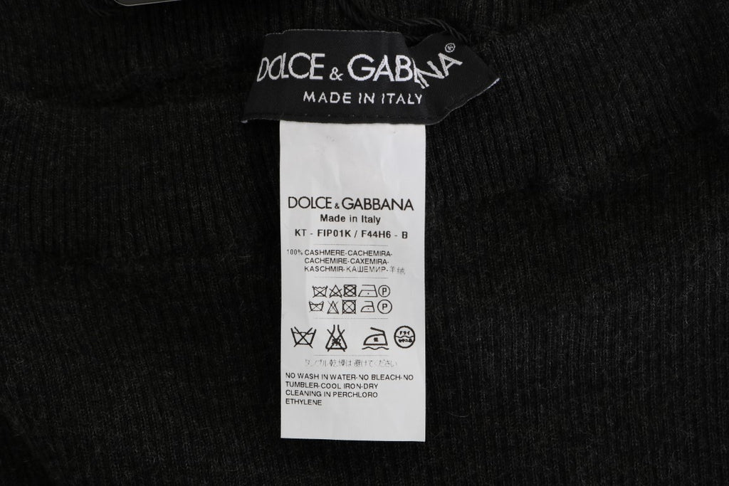 Collants gris en cachemire Dolce & Gabbana à rayures extensibles, tissu doux et confortable, porté sur une jambe.