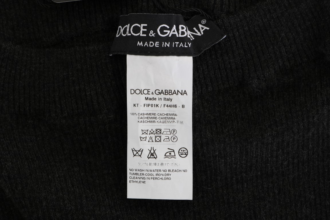 Collants gris en cachemire Dolce & Gabbana à rayures extensibles, tissu doux et confortable, porté sur une jambe.