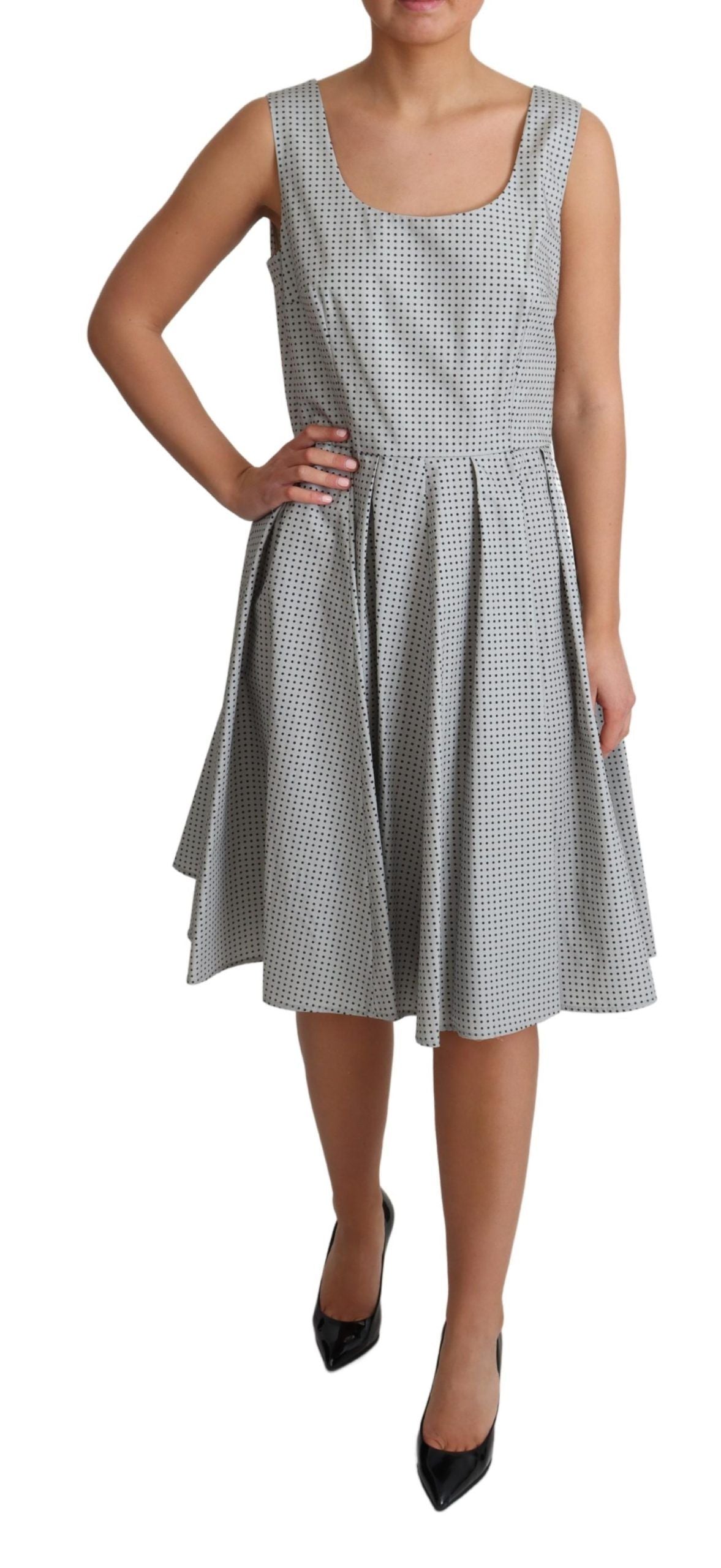 Robe trapèze en coton gris à pois Dolce & Gabbana, style élégant avec motif à pois, parfaite pour une tenue raffinée.