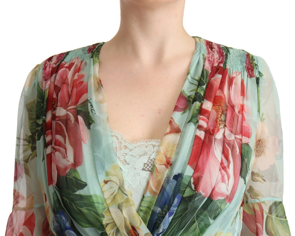 Robe midi à fleurs vertes Dolce & Gabbana avec manches longues et décolleté en V, élégante et fluide.