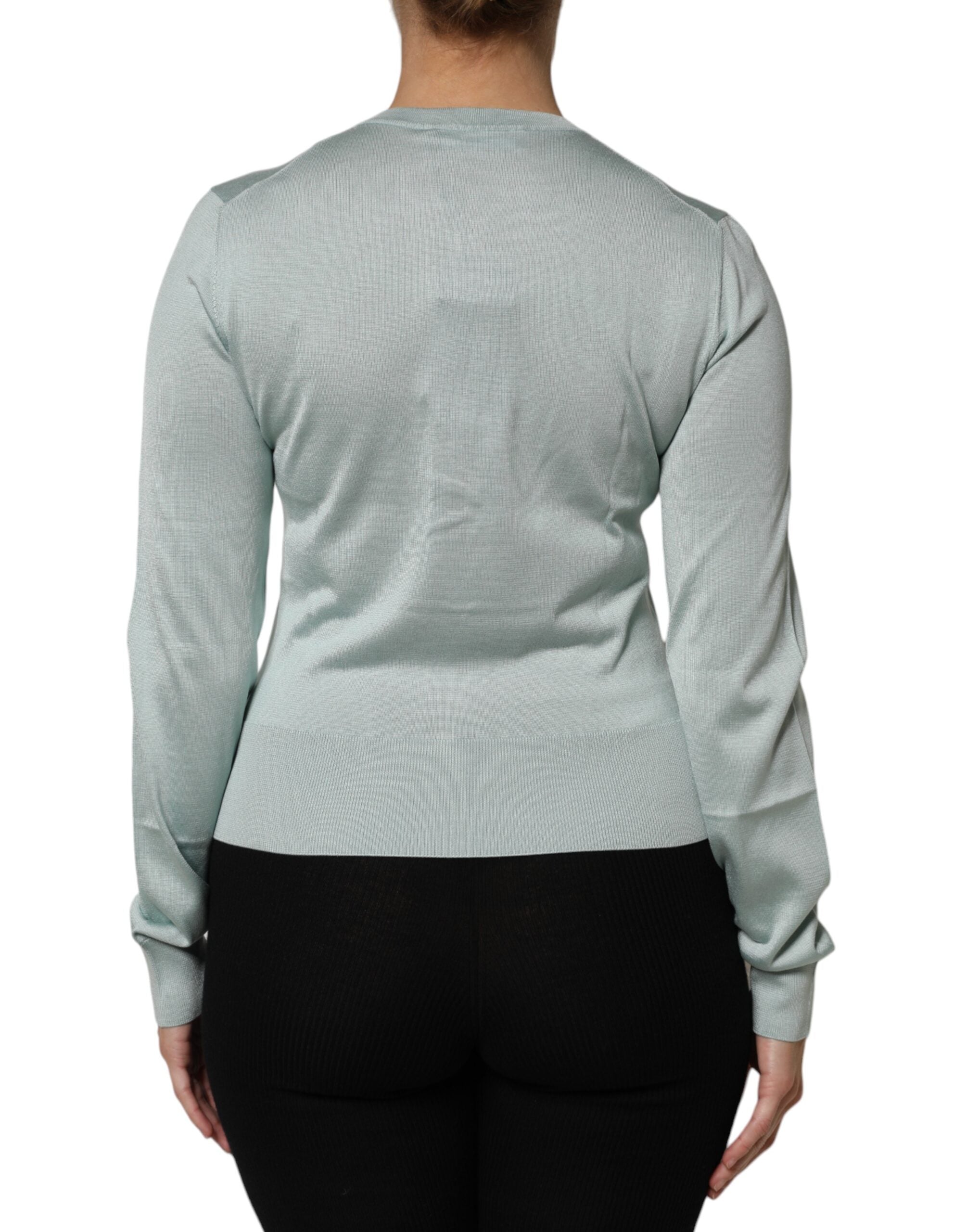 Pull en soie vert clair Dolce & Gabbana avec boutons, cardigan léger et élégant pour un style sophistiqué.