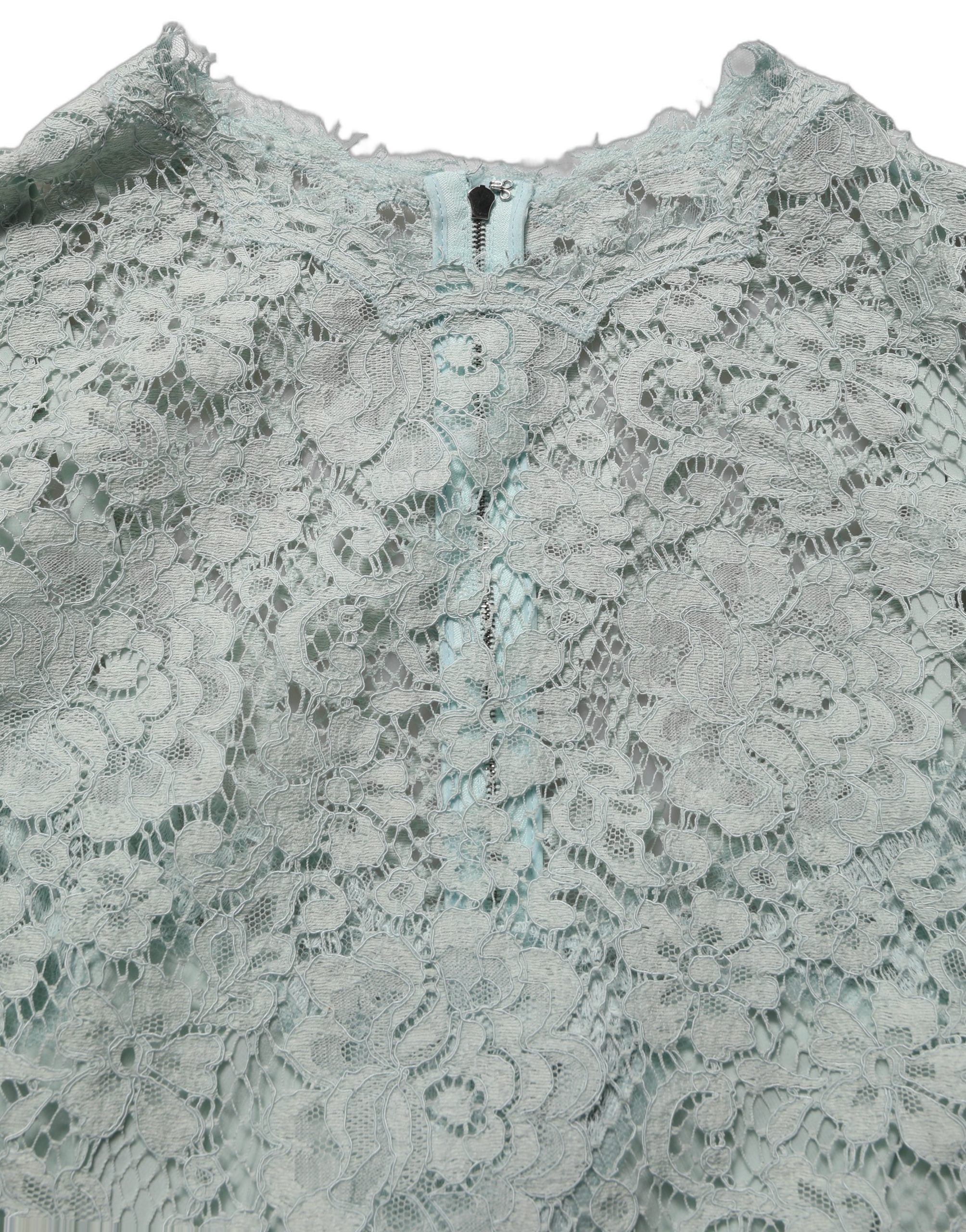 Robe sans manches en dentelle vert menthe de Dolce & Gabbana, longueur genoux, élégante et raffinée.