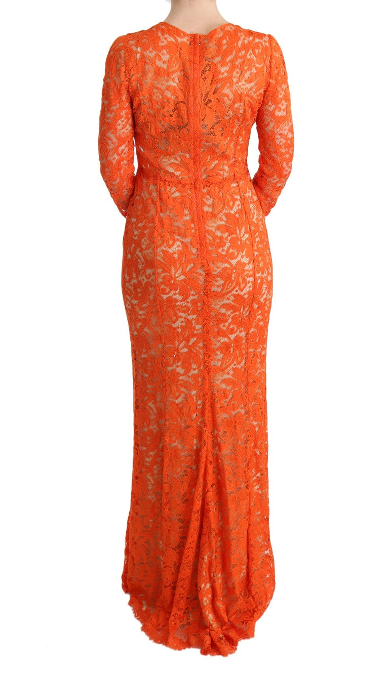 Robe longue Dolce & Gabbana en tissu orange à fleurs avec broderies, coupe fourreau élégante et détails floraux sophistiqués.