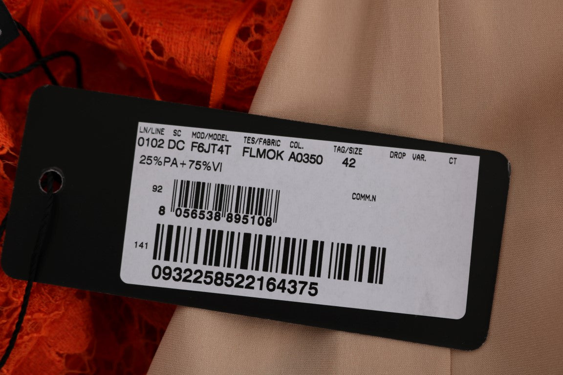 Robe longue Dolce & Gabbana à fleurs orange, silhouette ajustée, tissu ricamo, élégante et sophistiquée.
