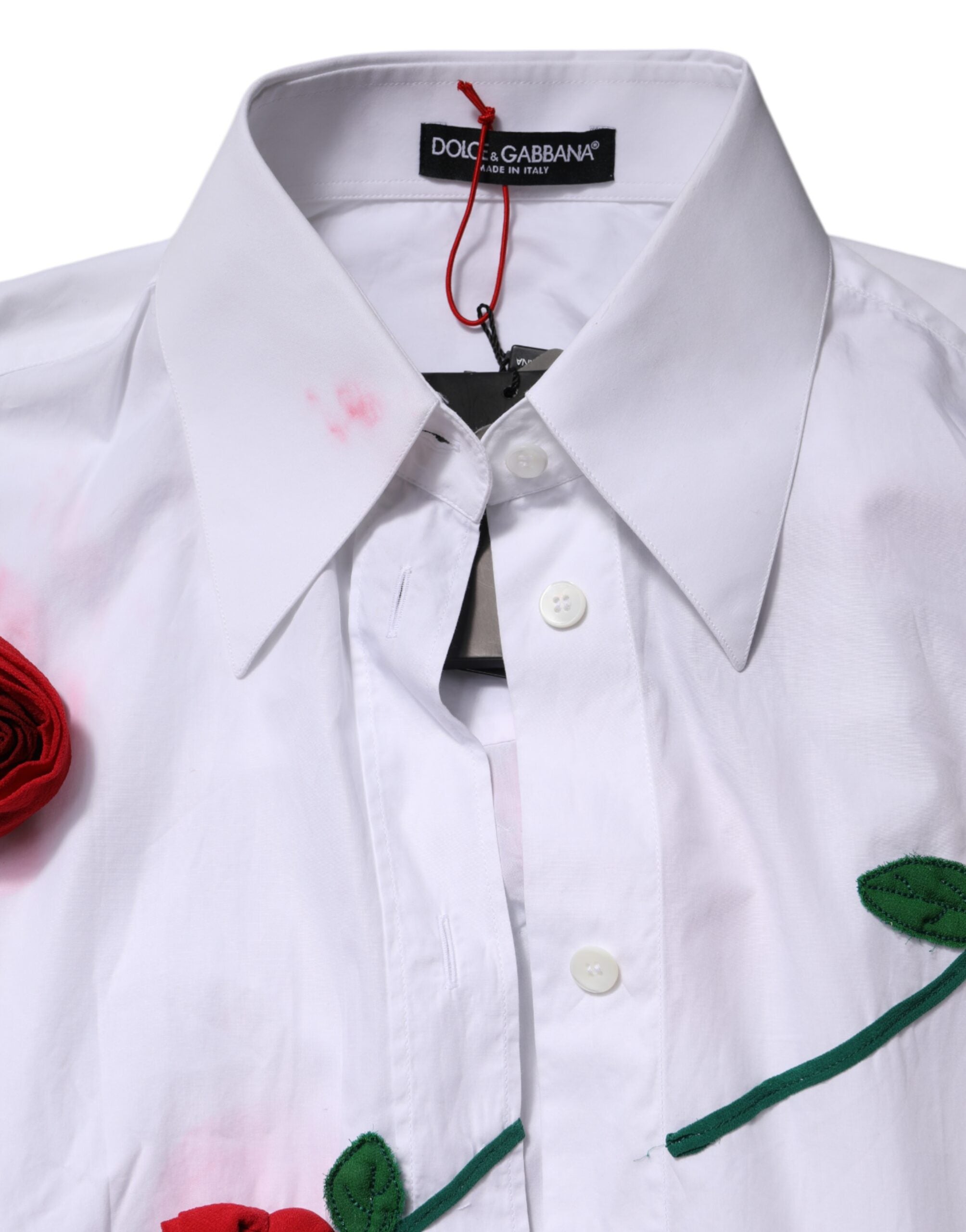 Chemise Dolce & Gabbana blanche en coton avec appliqués floraux, style élégant pour femme.