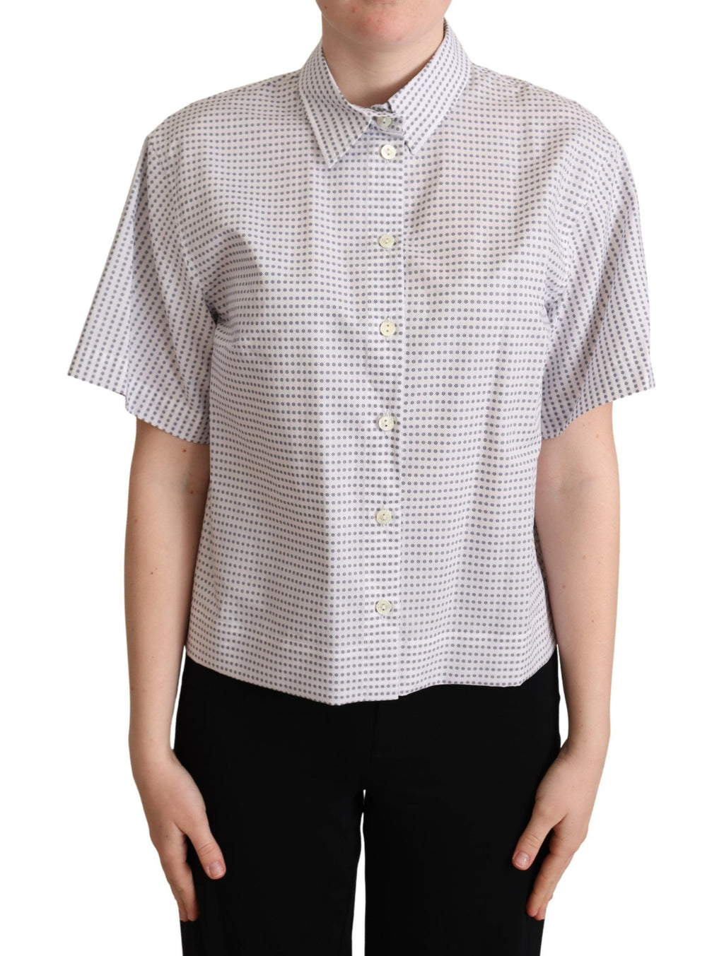 Chemise blanche à pois Dolce & Gabbana avec col, tissu léger et élégant, idéale pour un look chic et tendance.