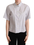 Chemise blanche à pois Dolce & Gabbana avec col, tissu léger et élégant, idéale pour un look chic et tendance.