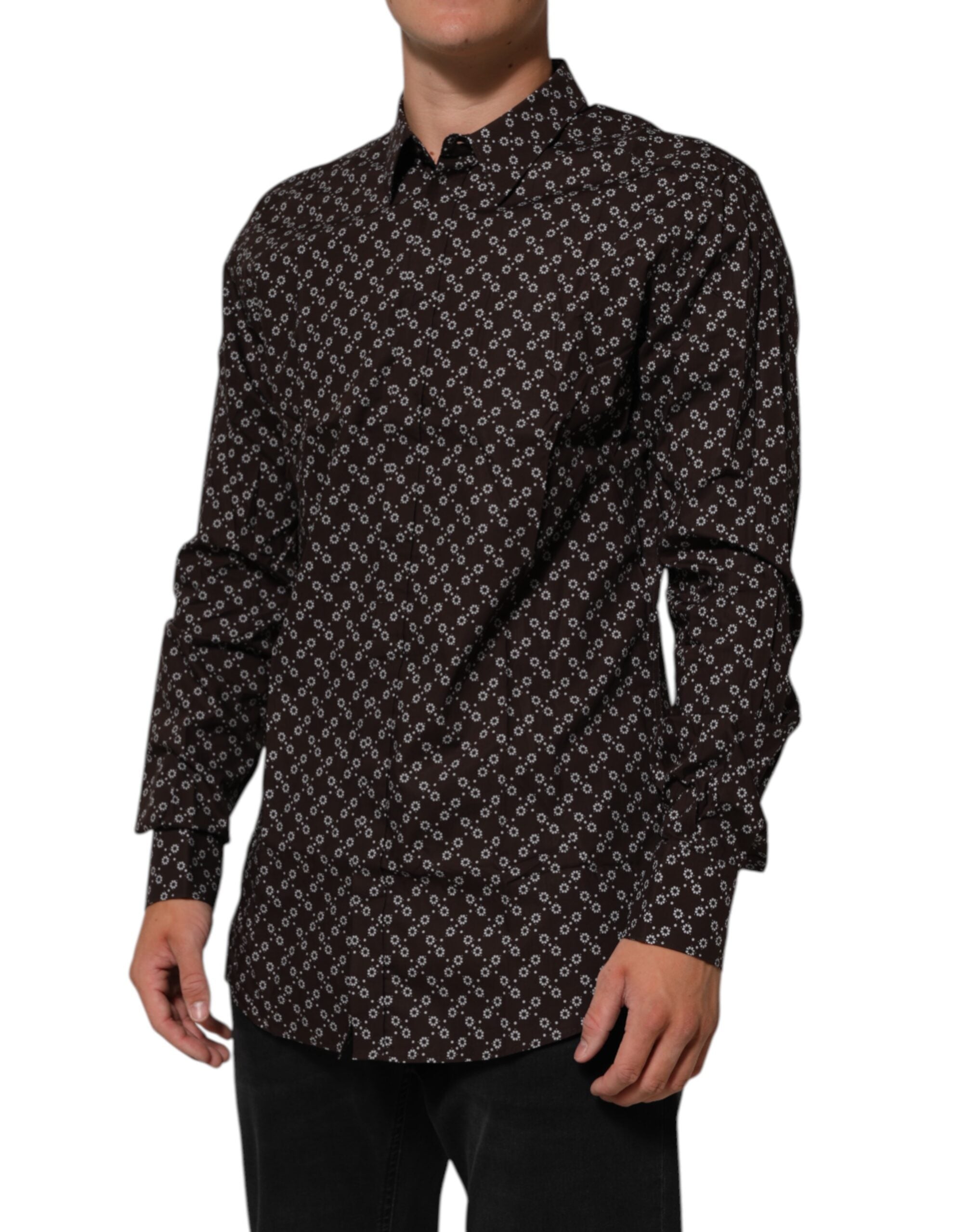 Chemise formelle Dolce & Gabbana marron avec motifs floraux, col contrasté et détails dorés visible sur l'image.