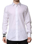 Chemise blanche en coton Dolce & Gabbana pour homme, style formel avec détails dorés et coupe élégante.