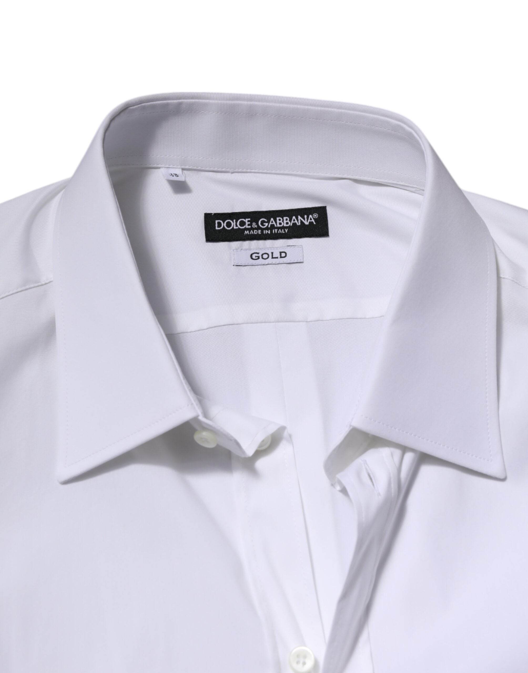 Chemise formelle blanche à manches longues Dolce & Gabbana avec détails dorés, élégante pour homme.
