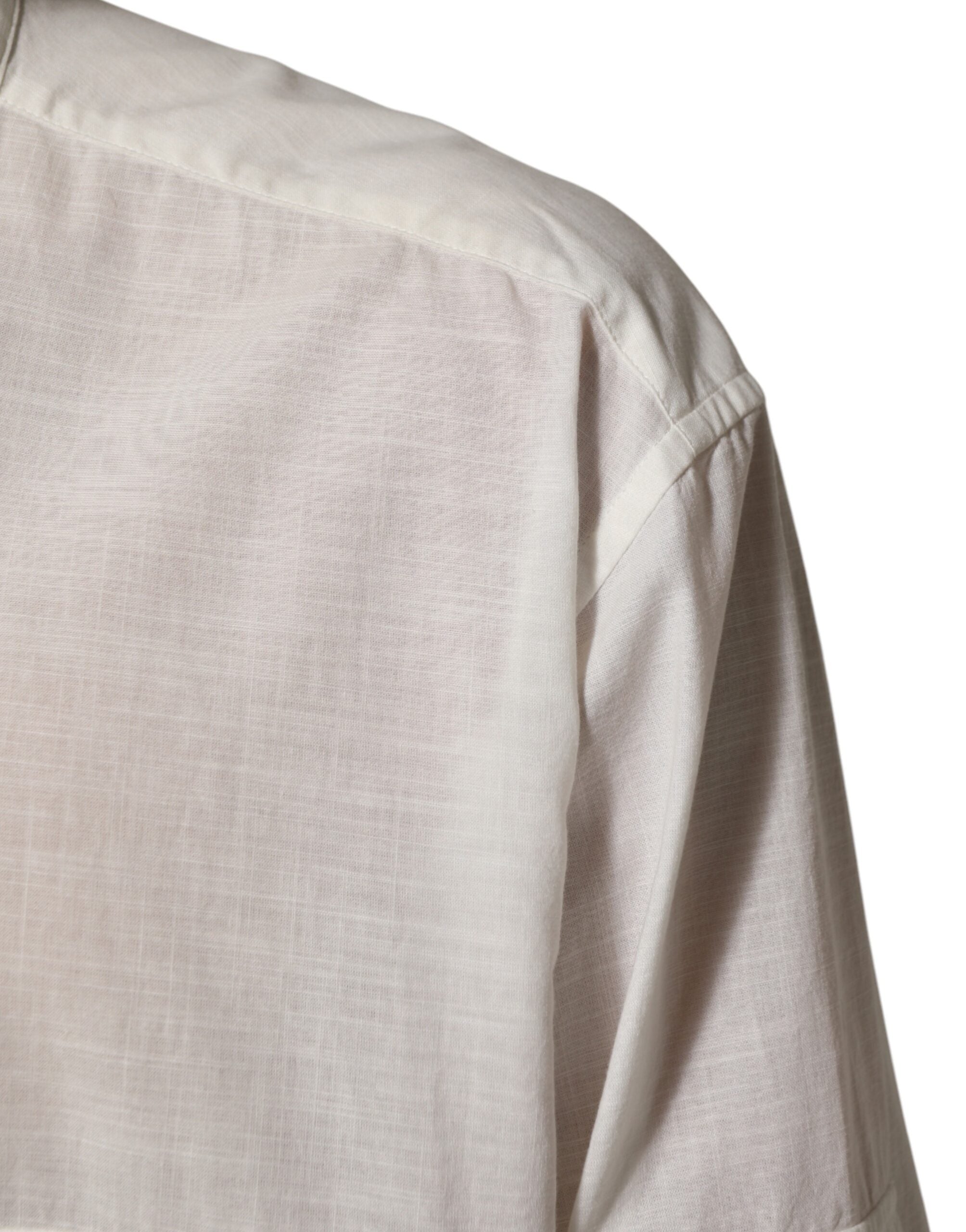 Chemise blanche en coton à imprimé floral Dolce & Gabbana avec boutons, vue de face.