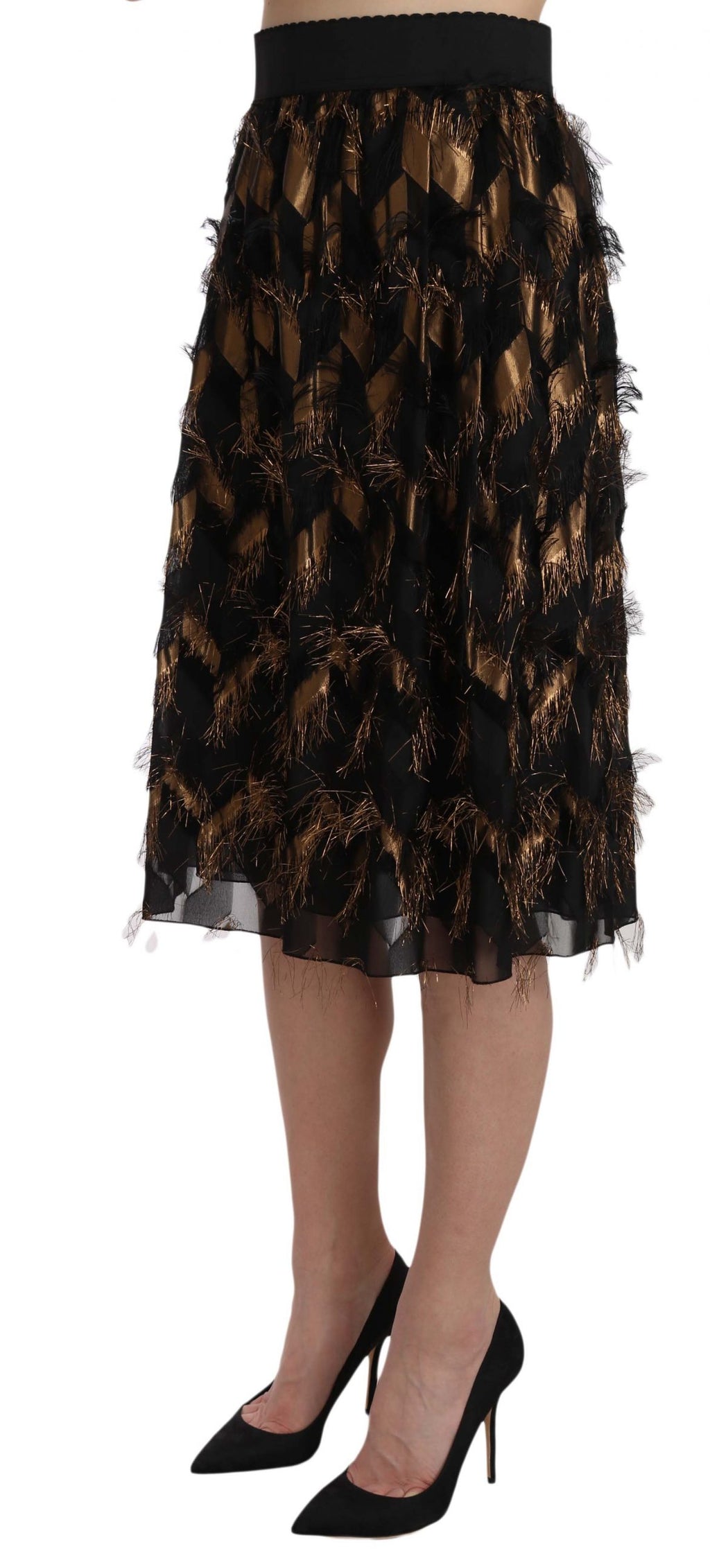 Jupe crayon Dolce & Gabbana noire et or avec franges métalliques, coupe évasée, détail brillant et élégant.