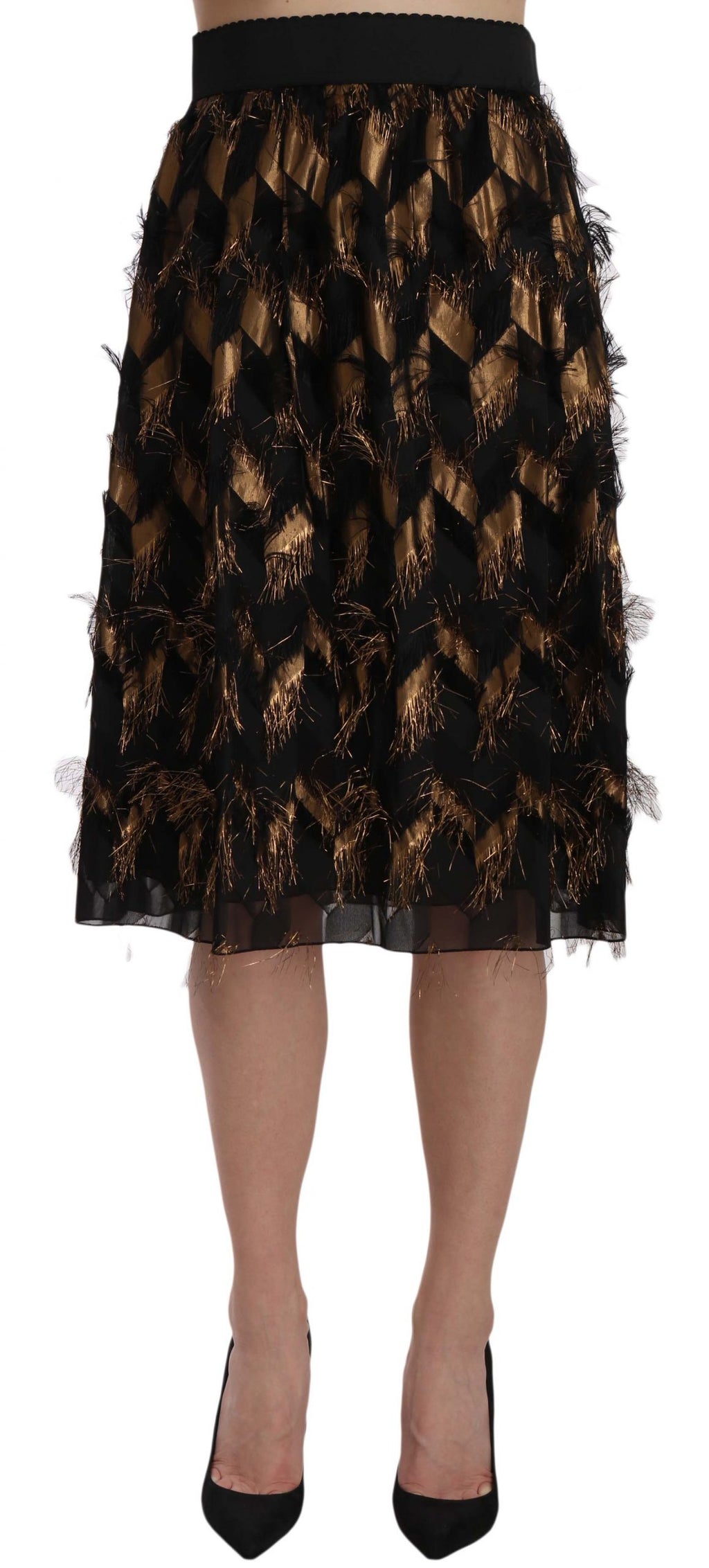 Jupe crayon Dolce & Gabbana noire et or à franges métalliques, style A-line, avec détails brillants et tendance.