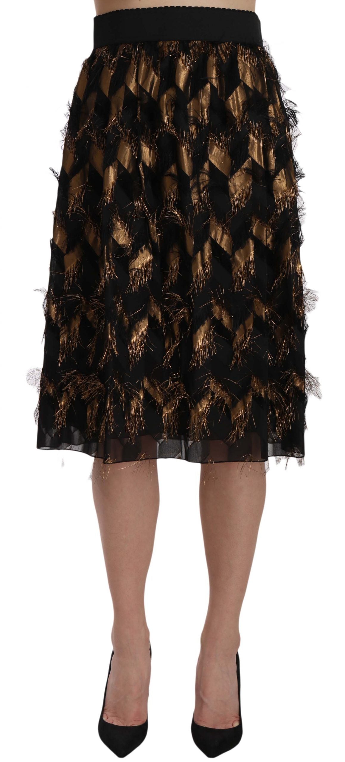 Jupe crayon Dolce & Gabbana noire et or à franges métalliques, style A-line, avec détails brillants et tendance.