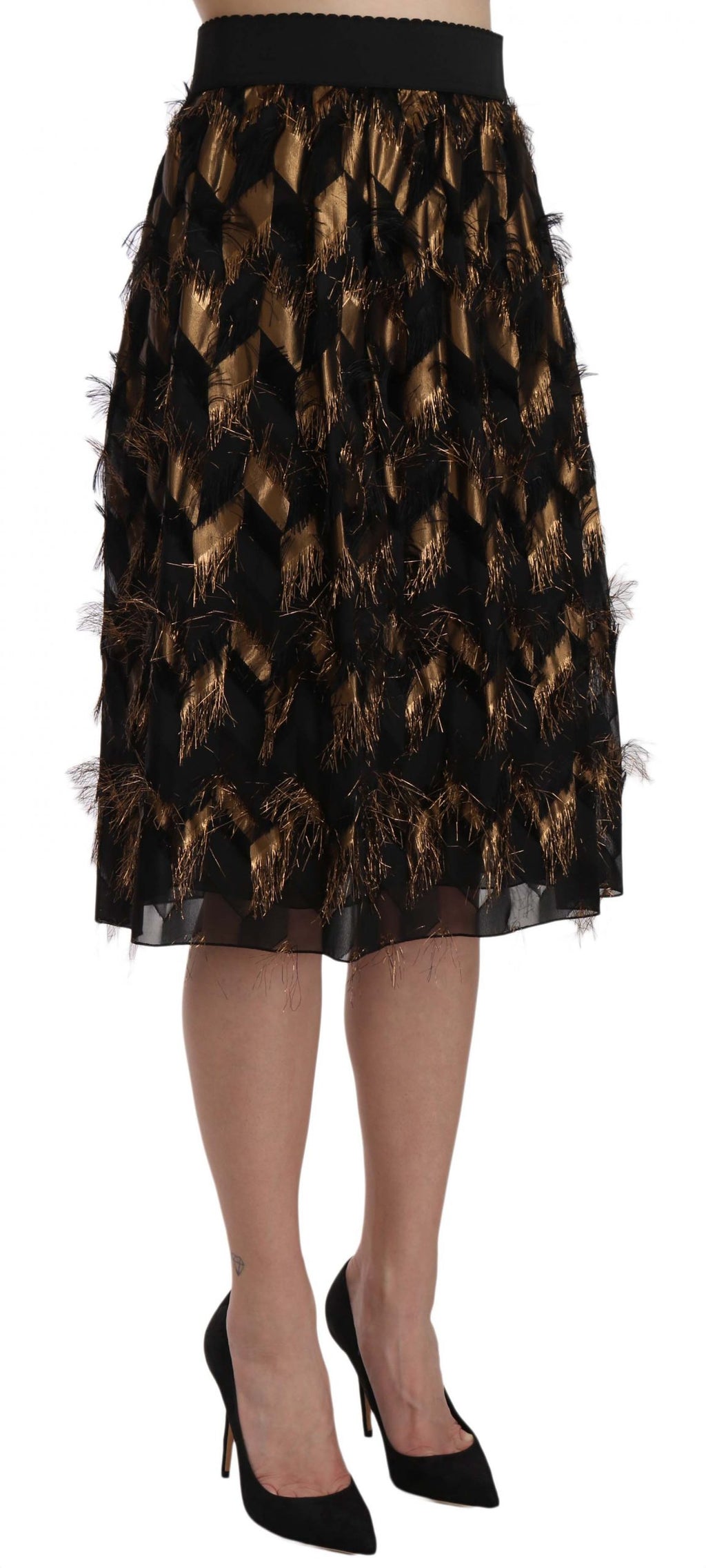 Jupe crayon Dolce & Gabbana noire et or avec franges métalliques, style A-line, élégante et tendance.