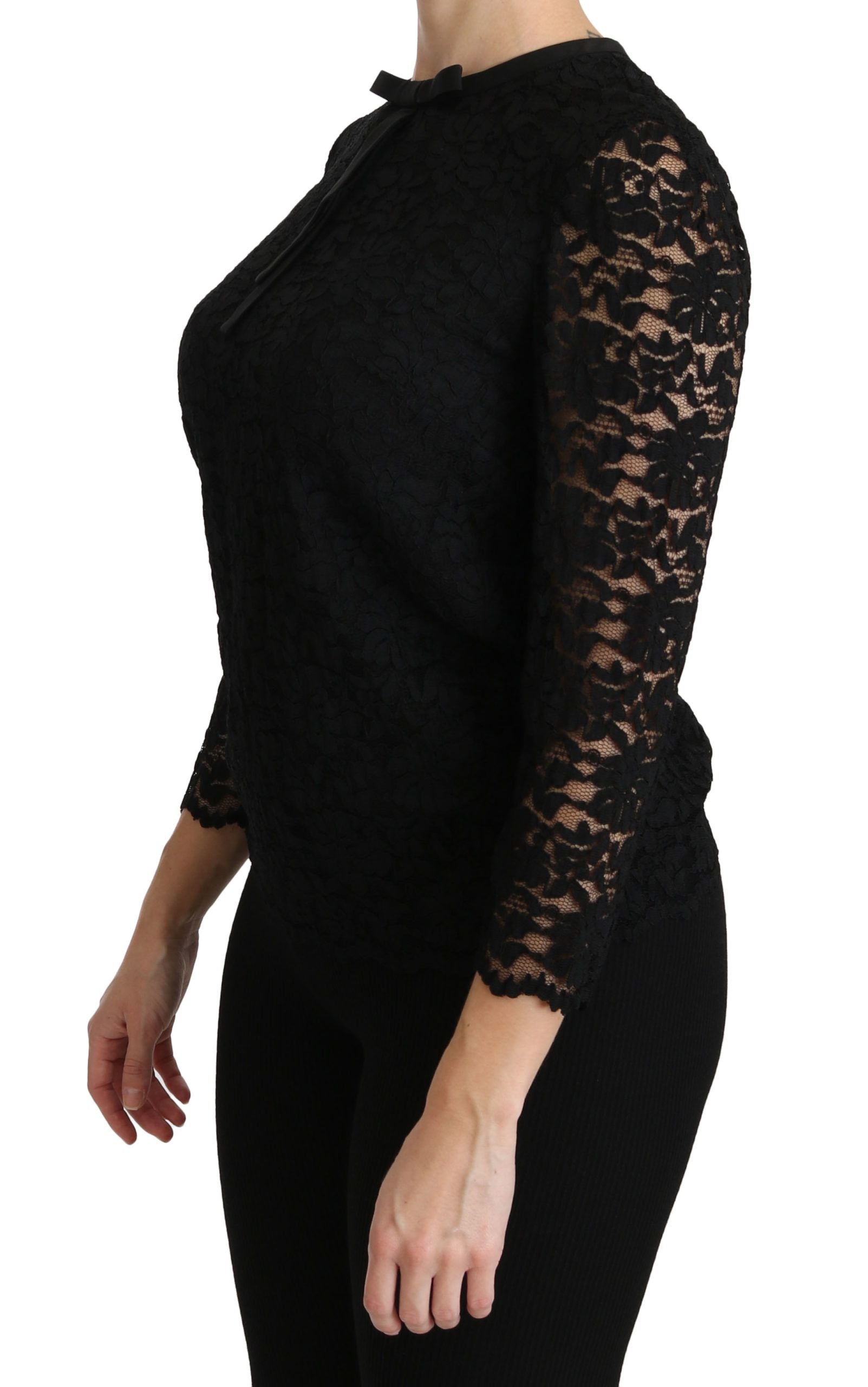 Blouse en nylon noire à manches longues en dentelle Dolce & Gabbana, élégante et sophistiquée, avec détails en dentelle noire.