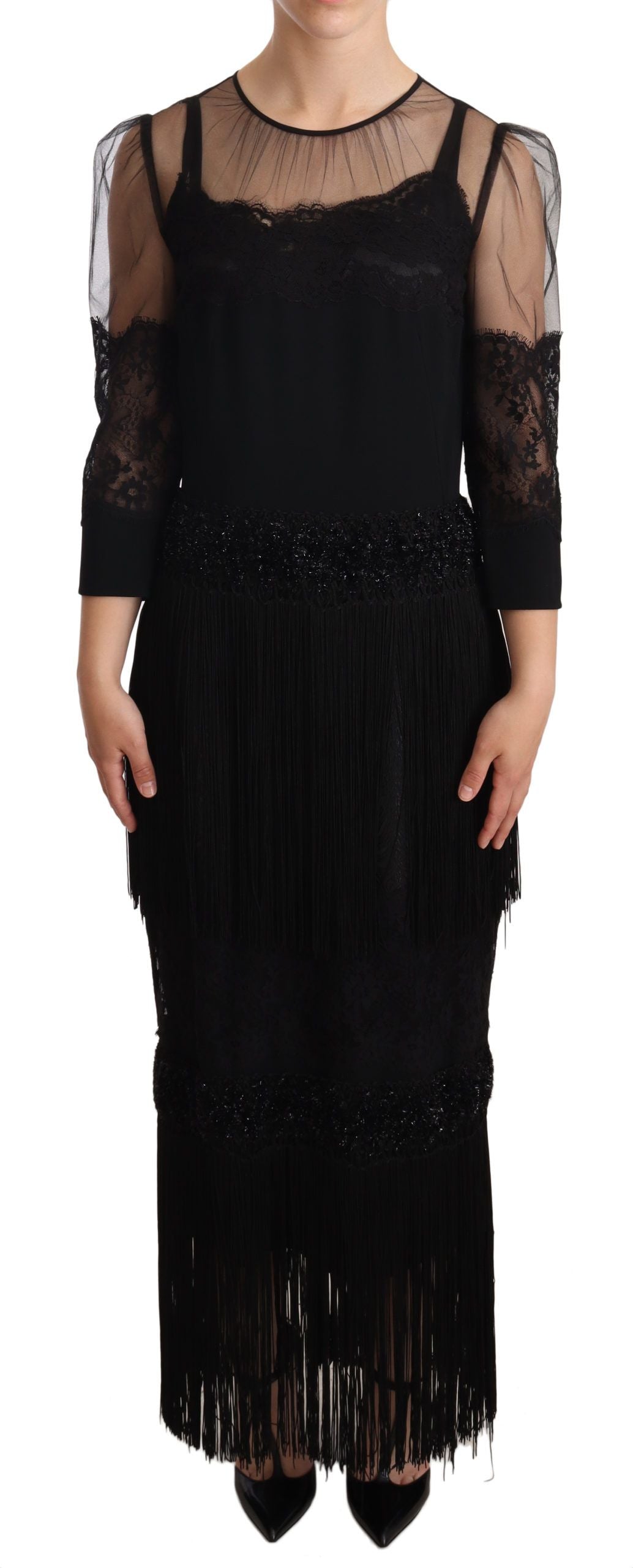 Robe longue noire en dentelle florale translucide avec cristaux, conçue par Dolce & Gabbana, vue sur le mannequin.