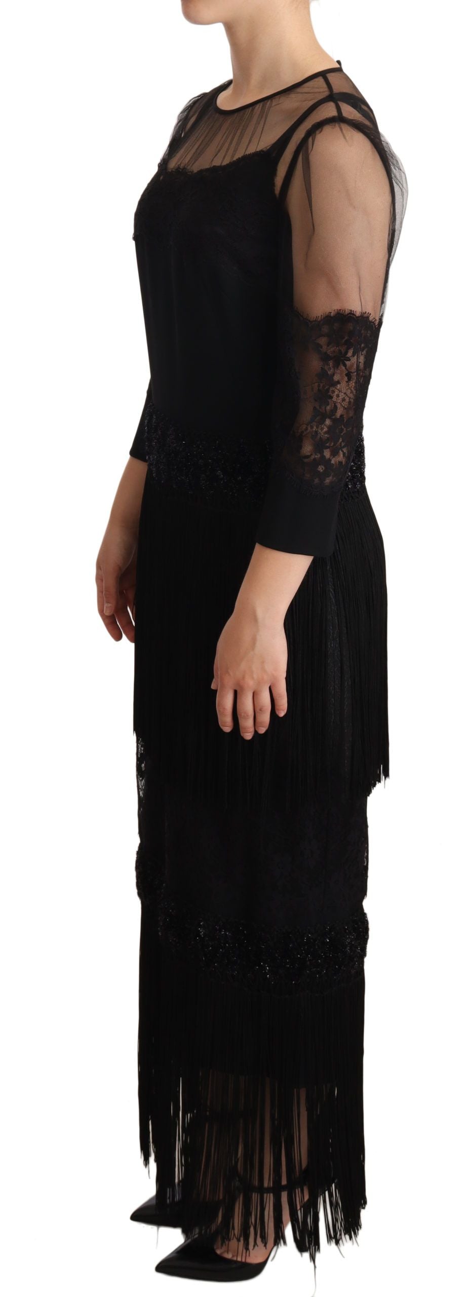 Robe longue en dentelle transparente noire avec motifs floraux et cristaux, signée Dolce & Gabbana, vue de face.