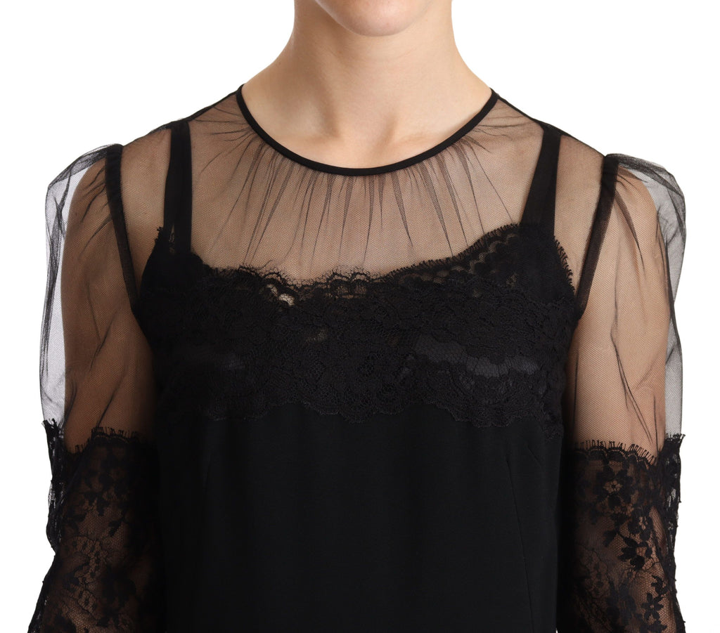 Robe longue en dentelle florale noire transparente avec cristaux, élégante et sophistiquée, signée Dolce & Gabbana.