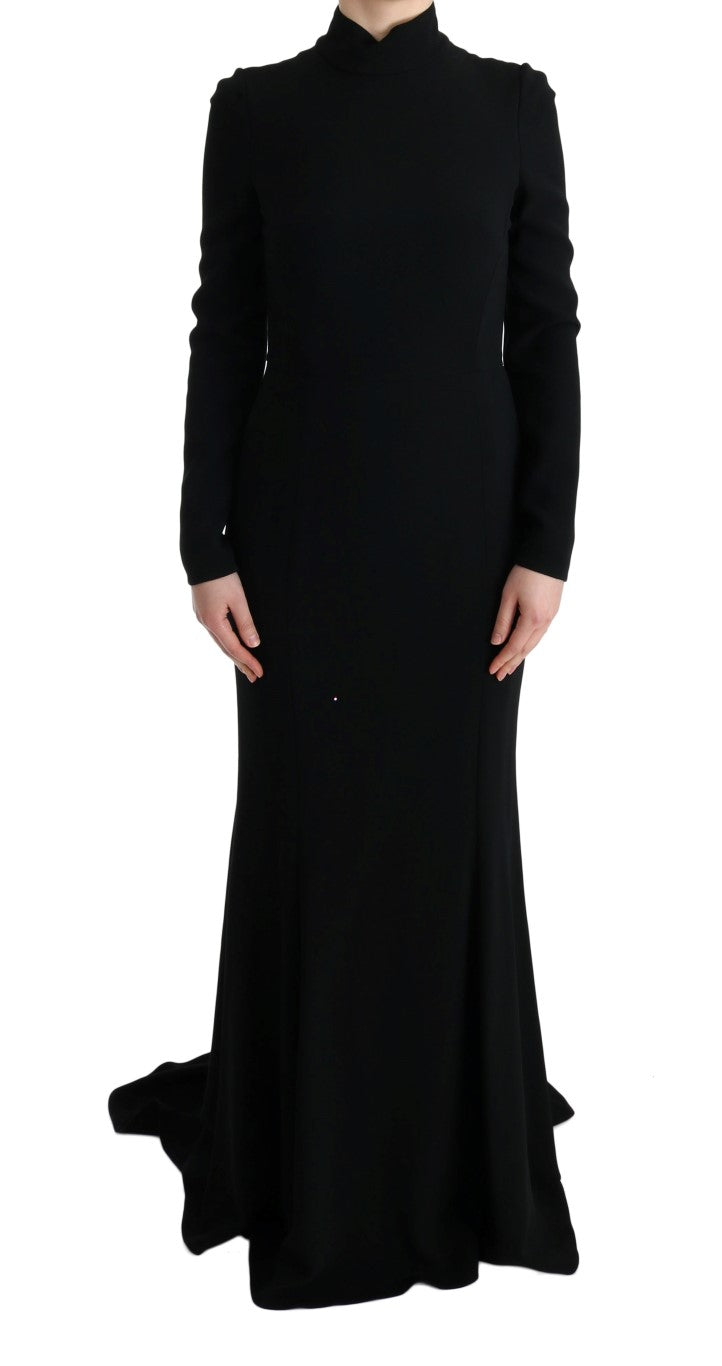 Robe longue noire en strech de Dolce & Gabbana, coupe cintrée et élégante, portée sur un mannequin.