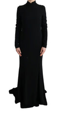 Robe longue noire en strech de Dolce & Gabbana, coupe cintrée et élégante, portée sur un mannequin.