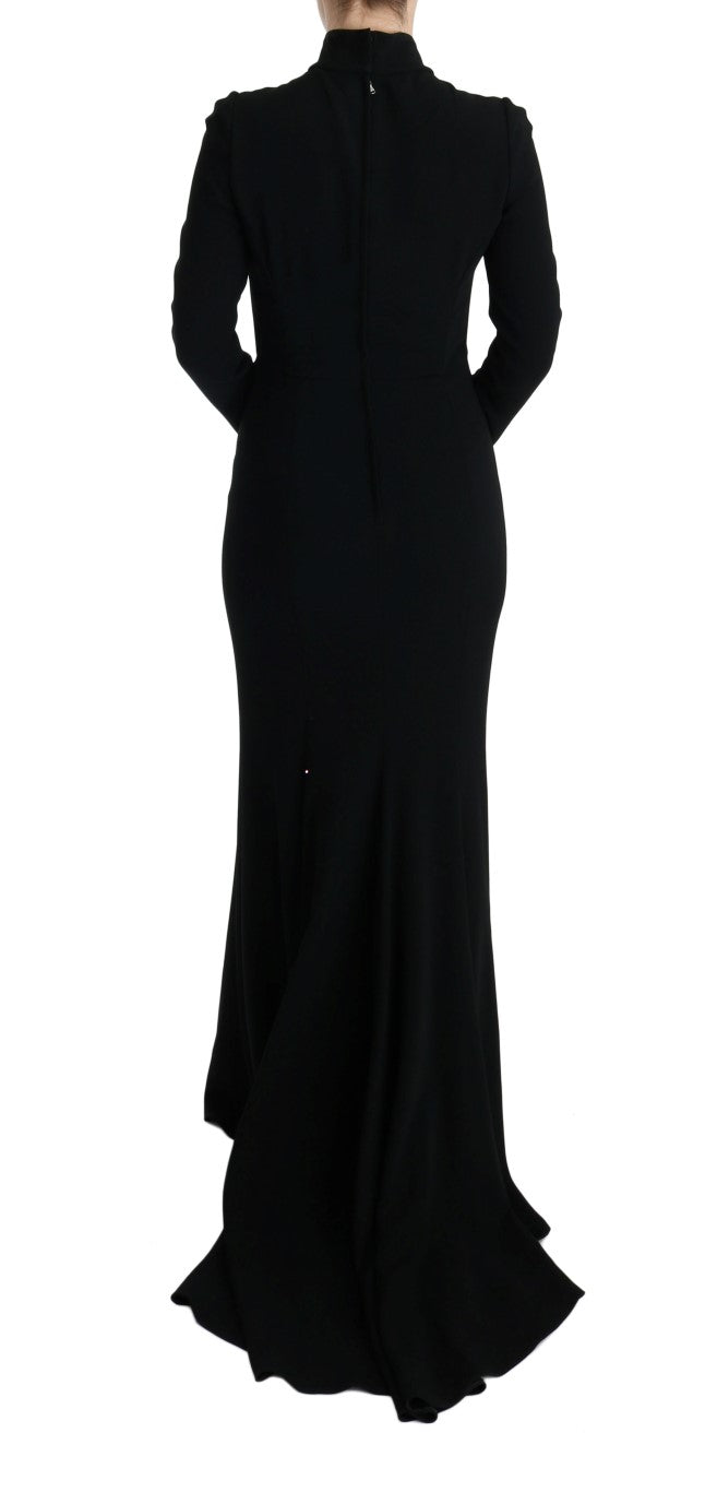 Robe longue noire en stretch de style sheath de Dolce & Gabbana, ajustée et élégante, portée sur mannequin.
